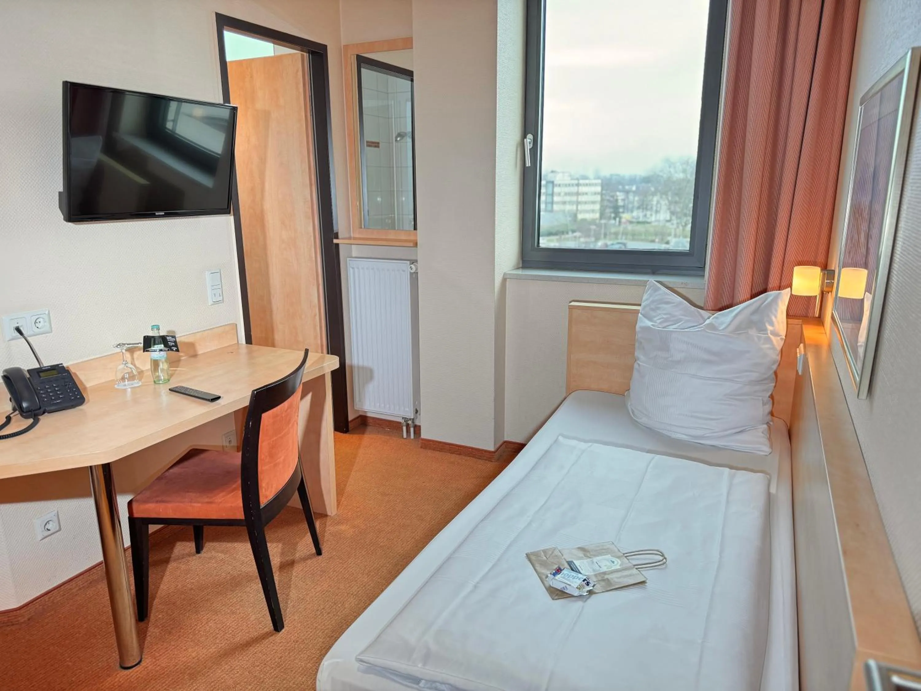 Photo of the whole room, Bed in Hotel Rhein-Ruhr Bottrop