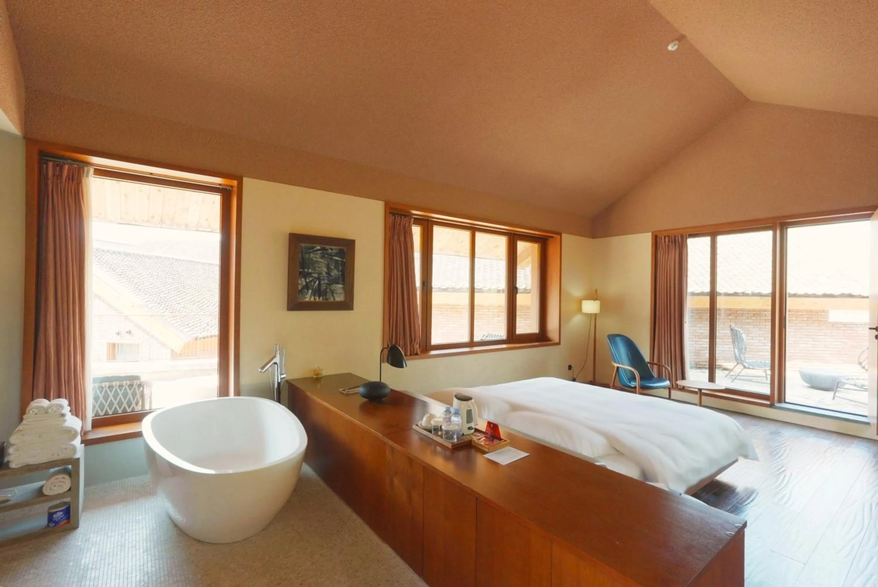 Photo of the whole room in Sansa Village Boutique Hotel at Mutianyu Great Wall Adjoin to Mutianyu Great Wall - Room with the View of Great Wall - Jacuzzi with the View of Great Wall - Vehicle Shuttle Service - International Catering - SPA& Nail Beauty Facilities