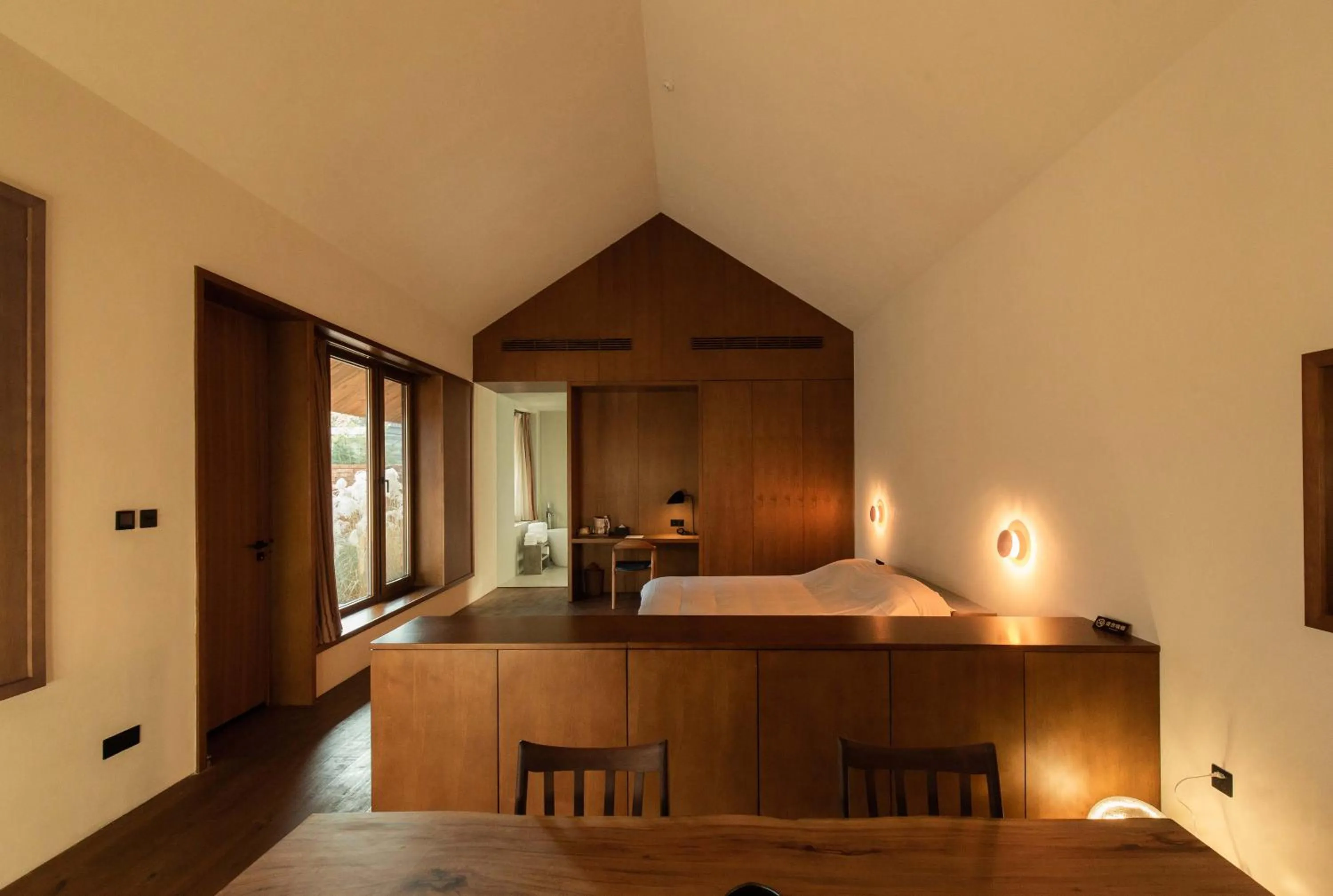 Photo of the whole room, Bed in Sansa Village Boutique Hotel at Mutianyu Great Wall Adjoin to Mutianyu Great Wall - Room with the View of Great Wall - Jacuzzi with the View of Great Wall - Vehicle Shuttle Service - International Catering - SPA& Nail Beauty Facilities