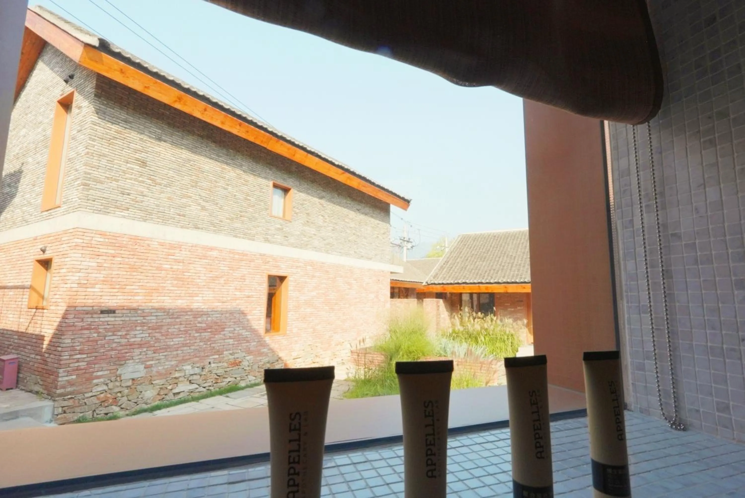 Property building in Sansa Village Boutique Hotel at Mutianyu Great Wall Adjoin to Mutianyu Great Wall - Room with the View of Great Wall - Jacuzzi with the View of Great Wall - Vehicle Shuttle Service - International Catering - SPA& Nail Beauty Facilities