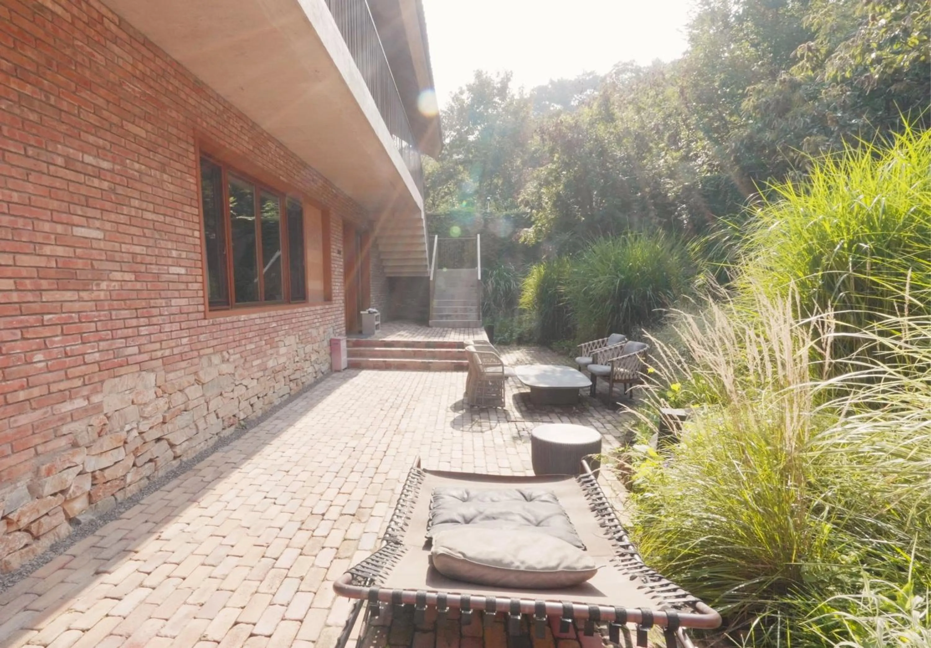 Garden in Sansa Village Boutique Hotel at Mutianyu Great Wall Adjoin to Mutianyu Great Wall - Room with the View of Great Wall - Jacuzzi with the View of Great Wall - Vehicle Shuttle Service - International Catering - SPA& Nail Beauty Facilities