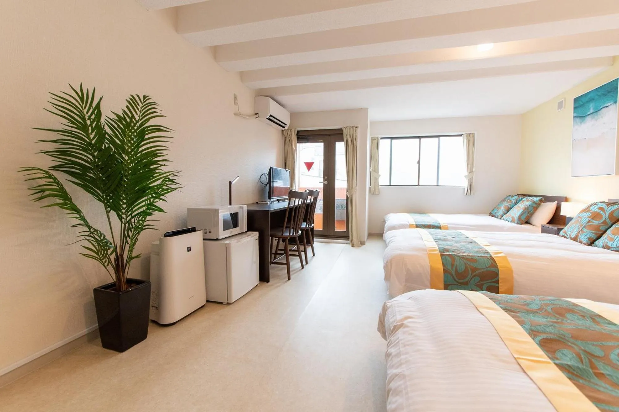 Bed in LUANAHOTEL IN NAKANO