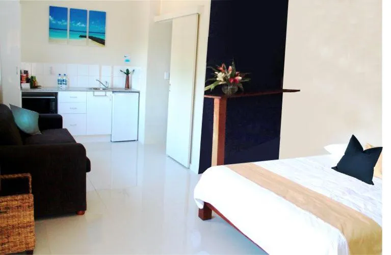 Bed in Vanuatu Beachfront Apartments