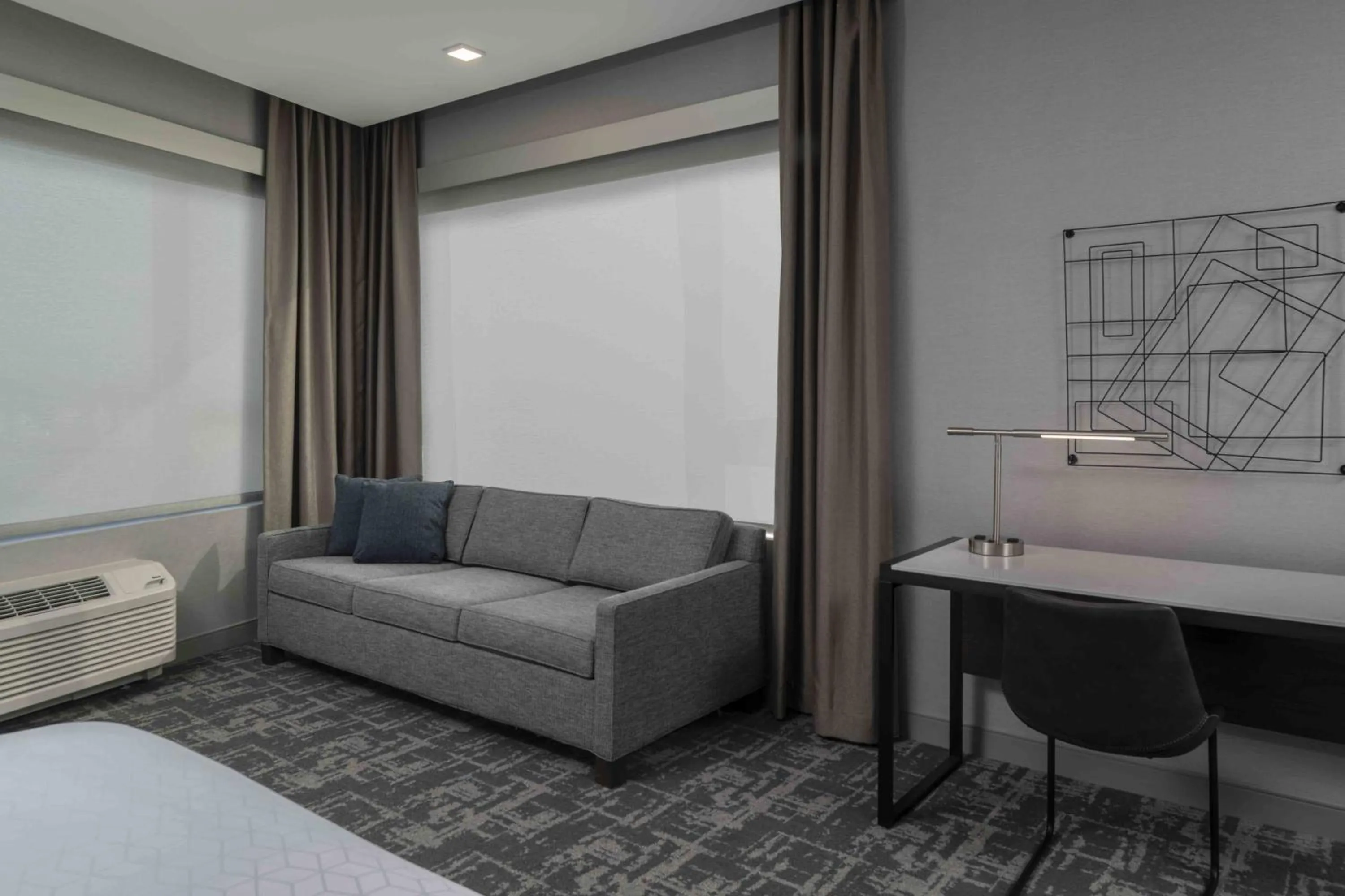 Living room, Bed in Staybridge Suites - Boston Logan Airport - Revere by IHG