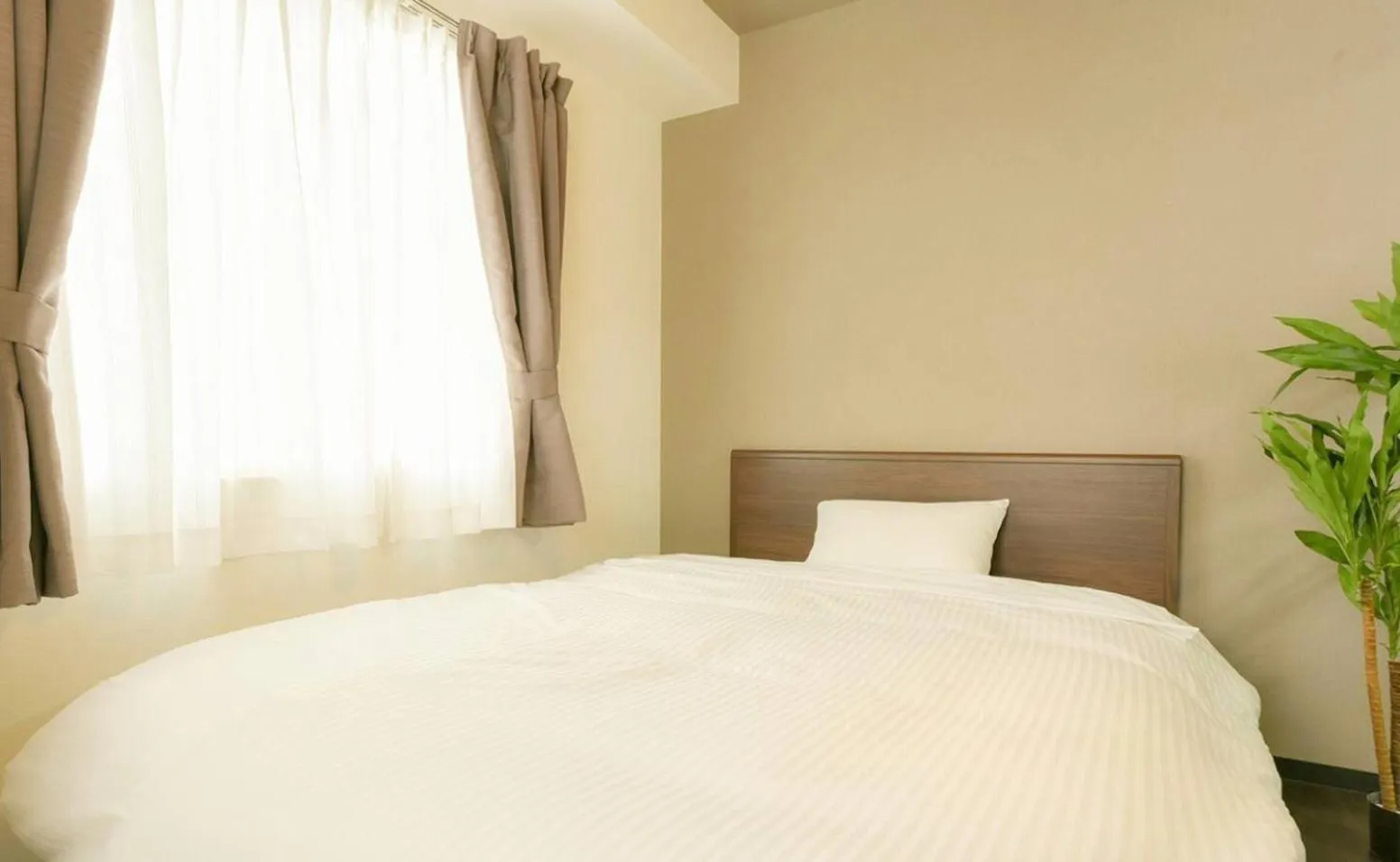 Bed in Suncourt Minami 6jo Nibankan / Vacation STAY 7447