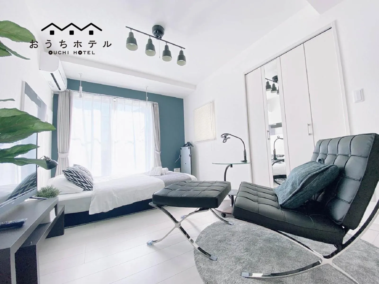 Bed in OUCHI HOTEL Hatsukaichi-Ekimae