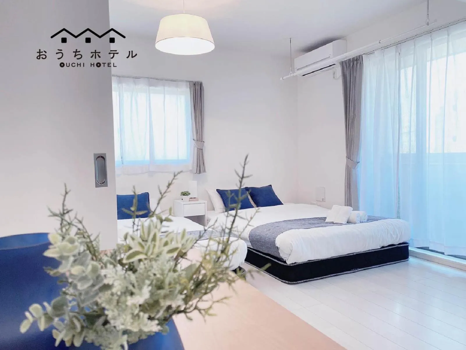 Bed in OUCHI HOTEL Miyajimaguchi