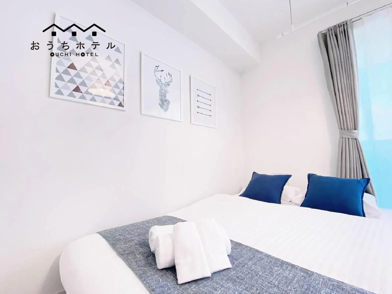 Bed in OUCHI HOTEL Miyajimaguchi