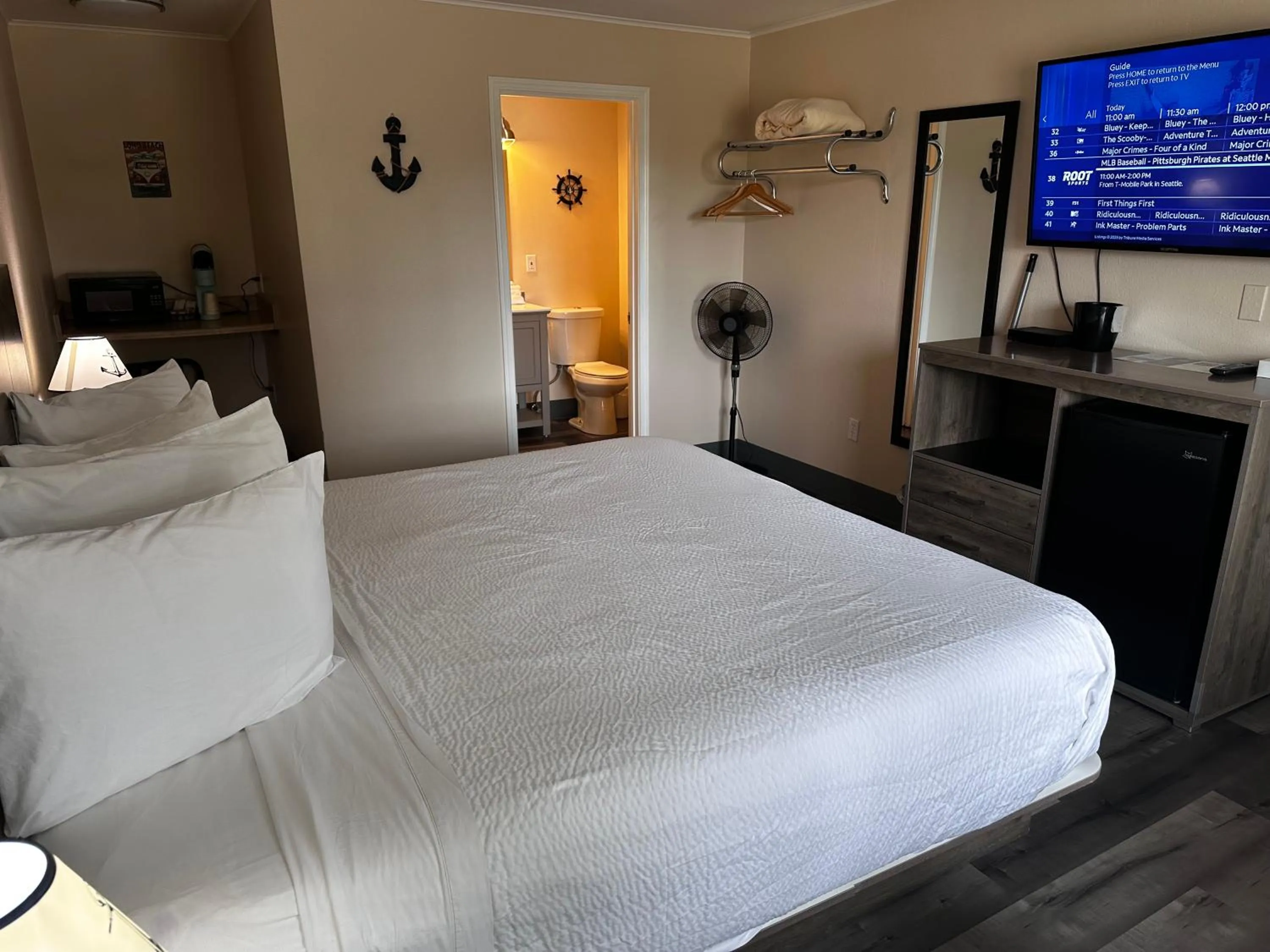 Bed in Coastal Inn and Suites