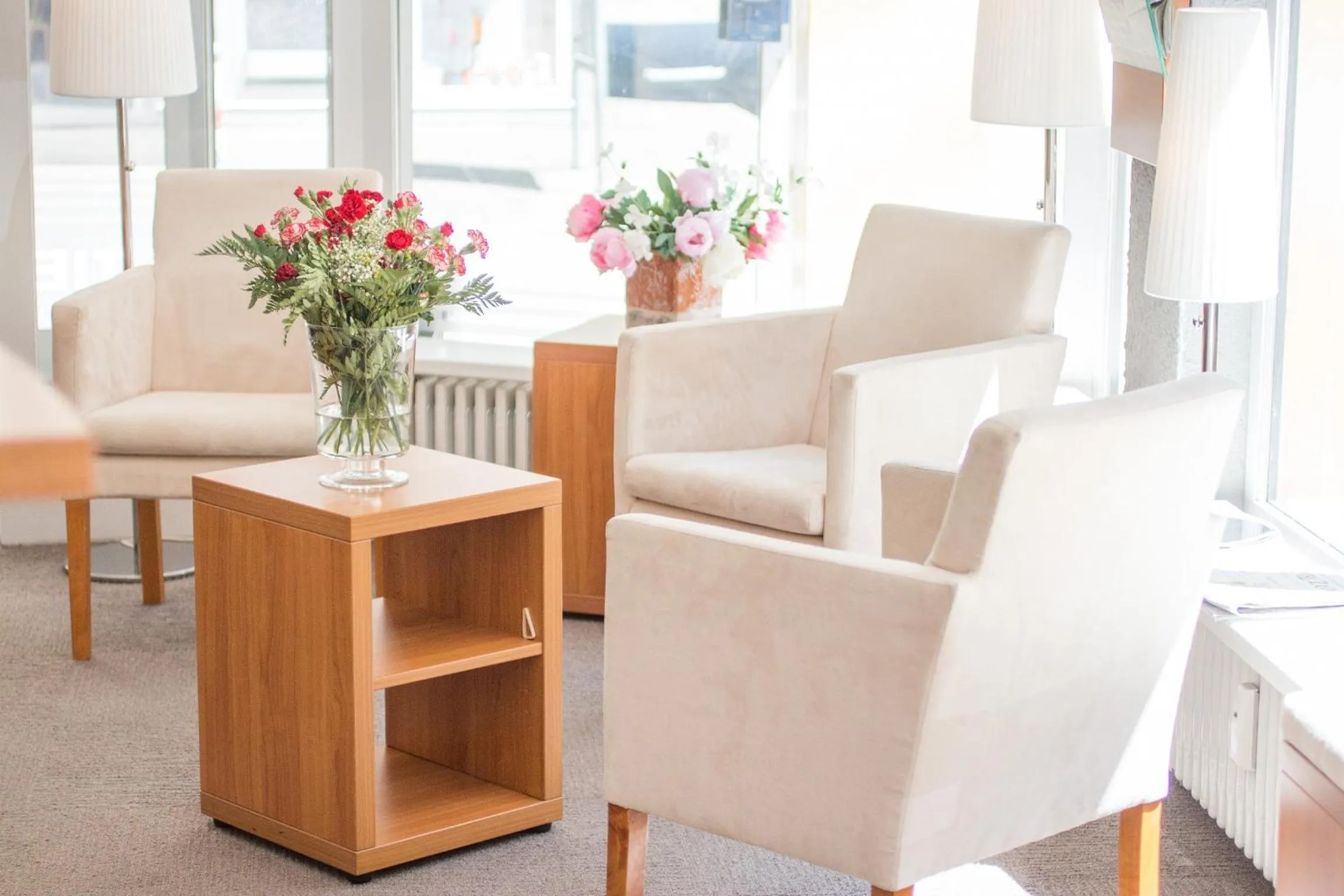 Communal lounge/ TV room in City Hotel Freiburg