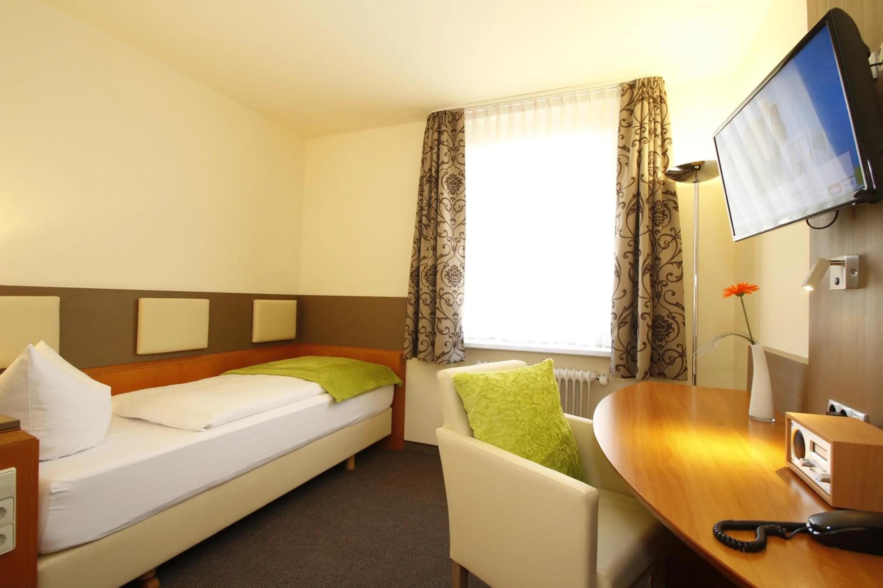 Bed in City Hotel Freiburg