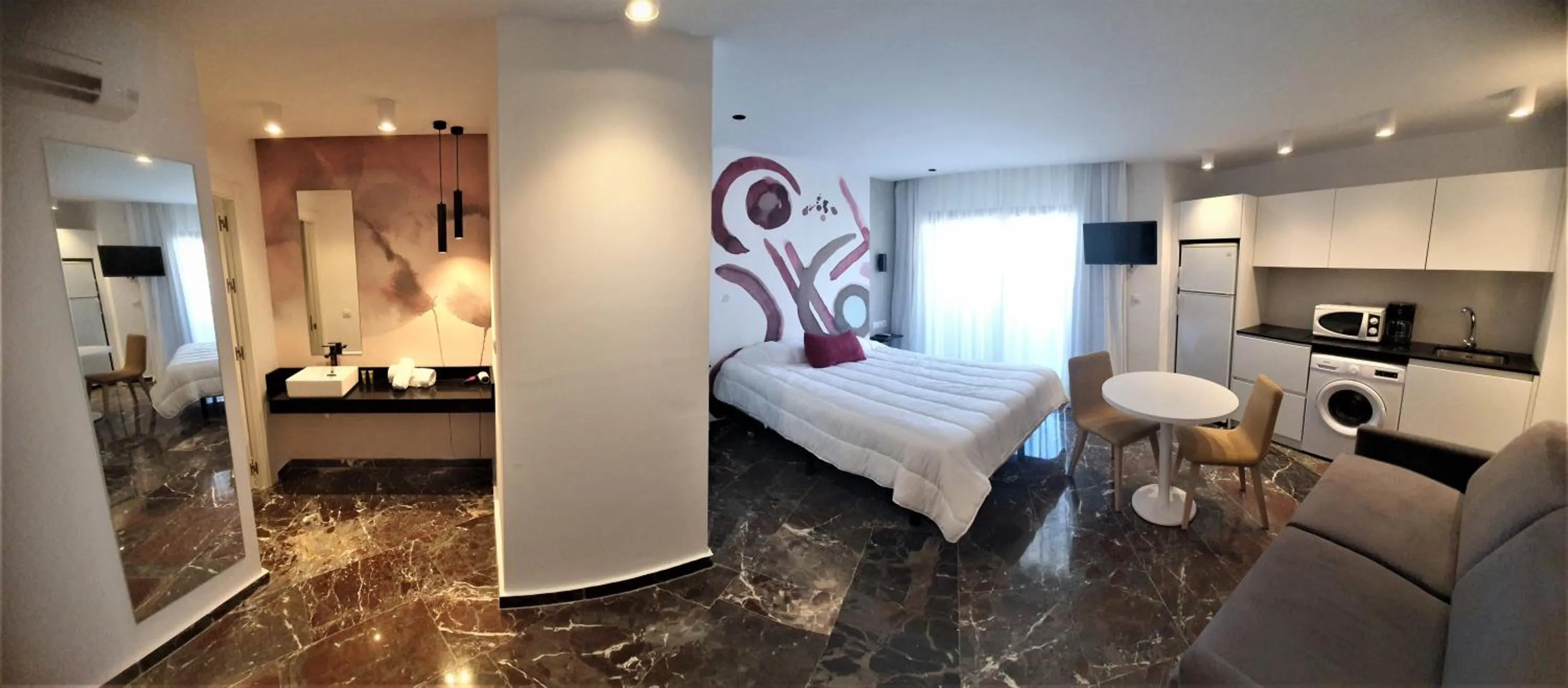 Photo of the whole room, Bed in Apartamentos San Jaime Center Suites