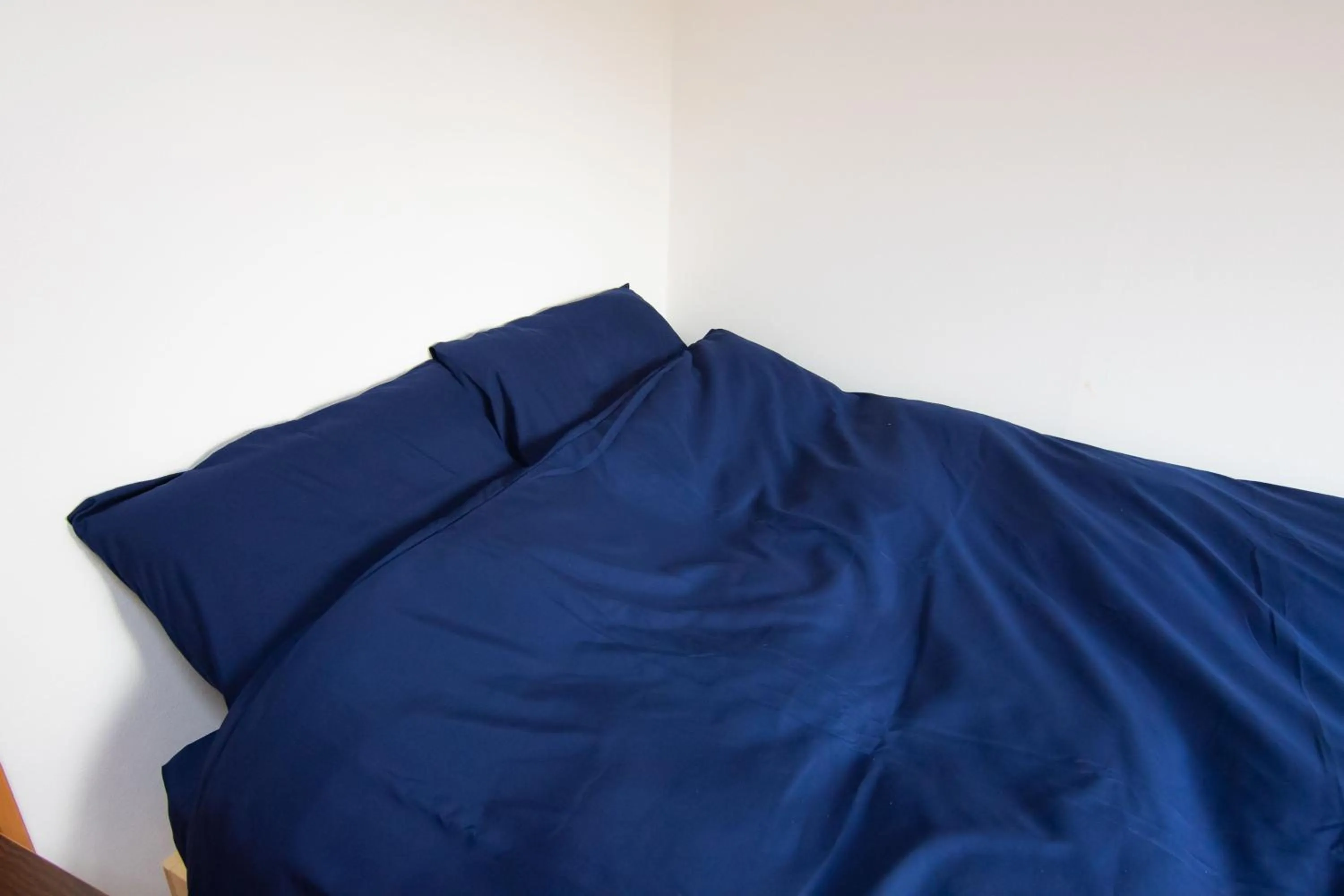 Bed in Yoyogi Apartment 2-401 by Tranova