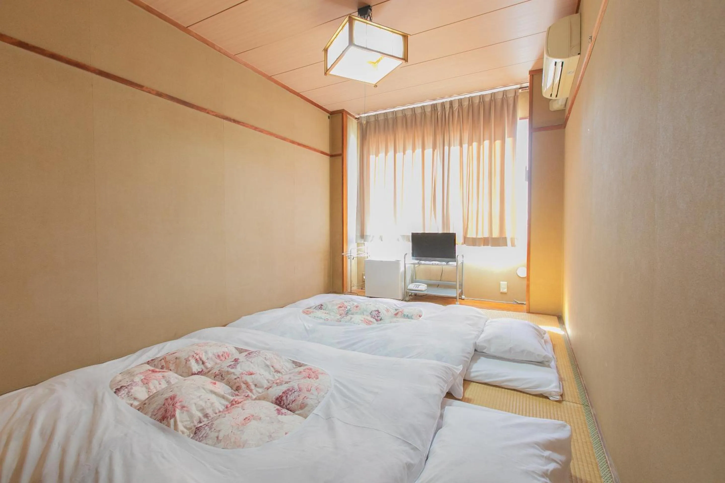 Photo of the whole room, Bed in Tabist Setouchinoyado Takehara Seaside