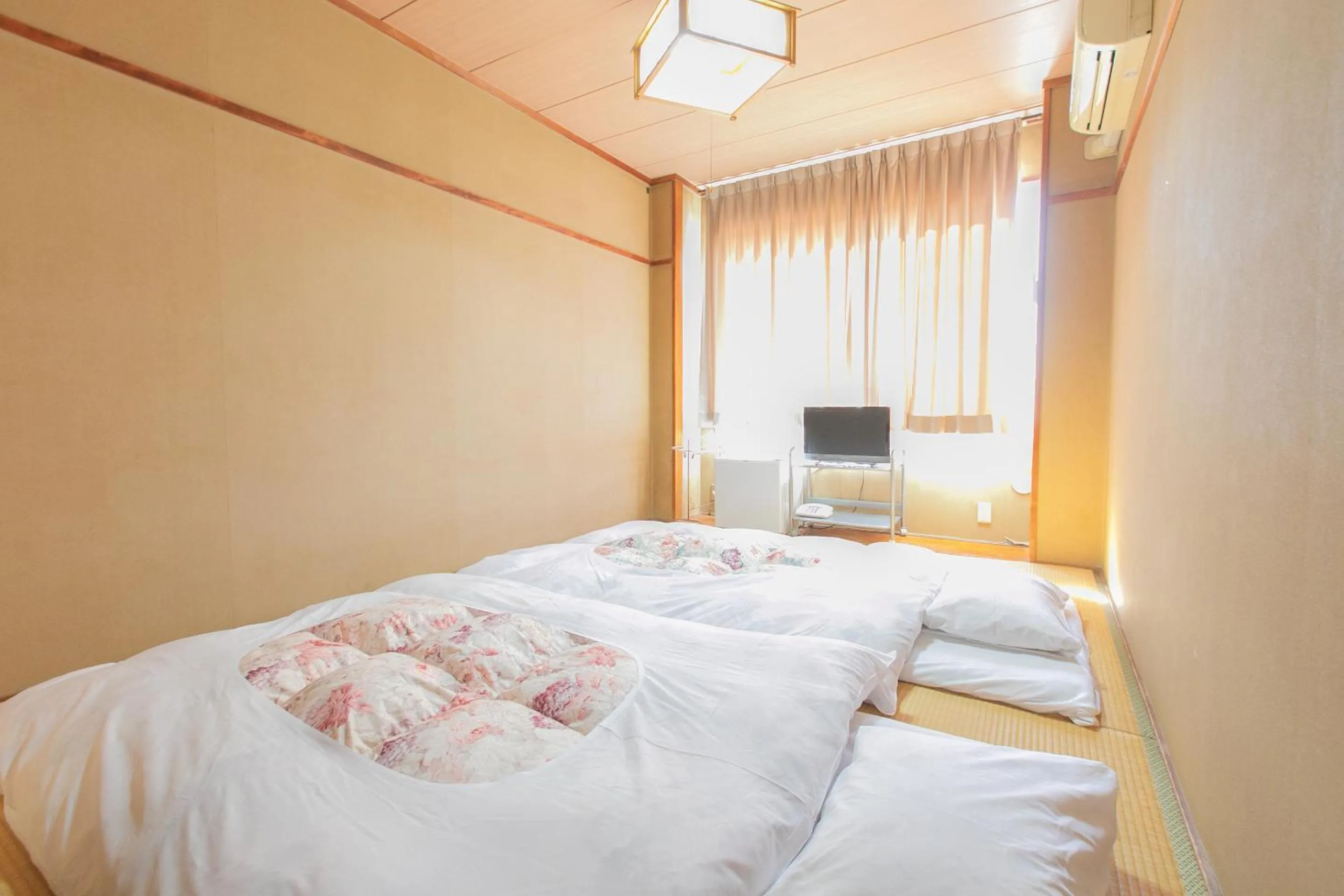 Photo of the whole room, Bed in Tabist Setouchinoyado Takehara Seaside