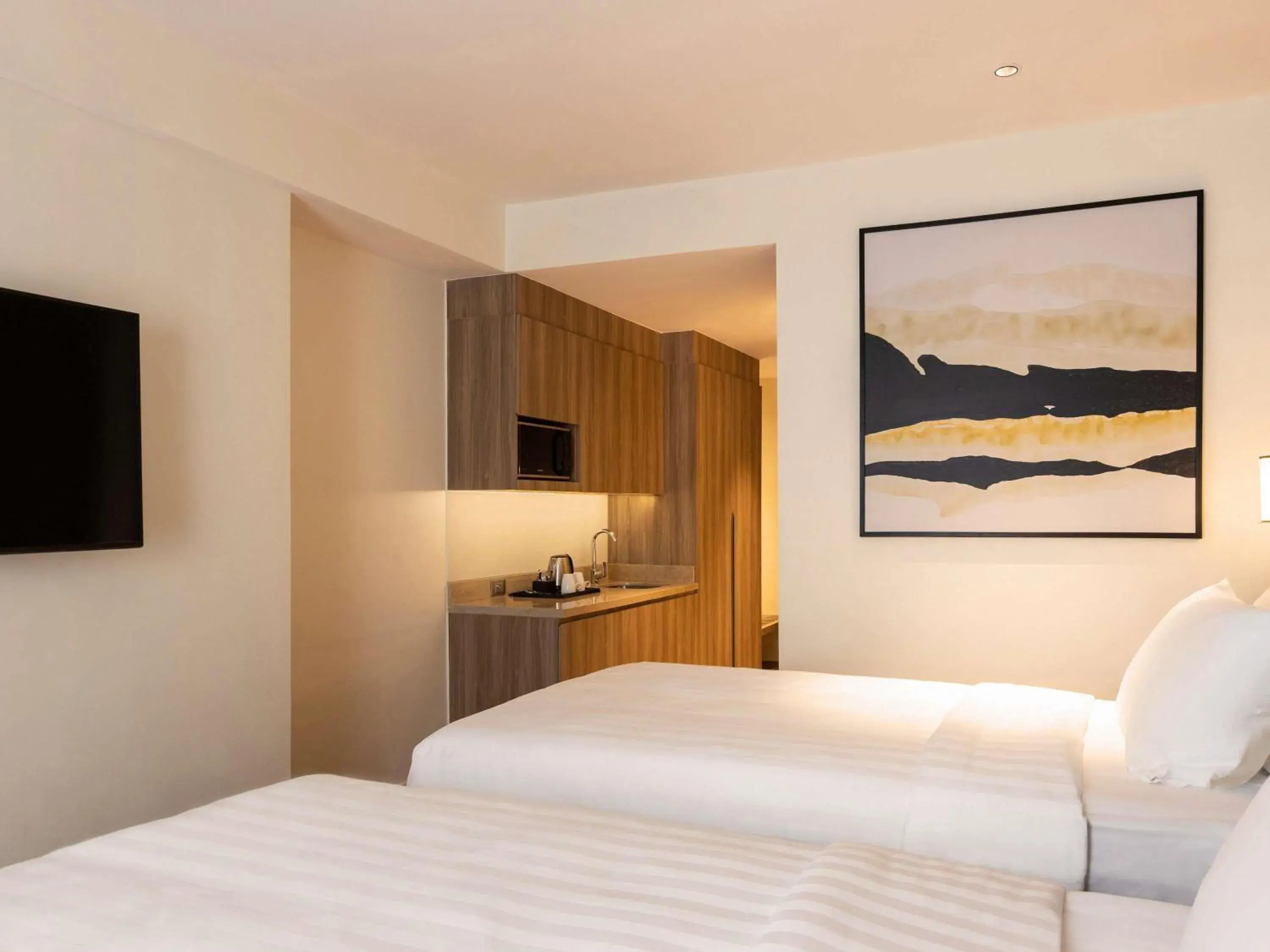 Standard Twin Room in Novotel Suites Manila at Acqua Standard Twin Room in Novotel Suites Manila at Acqua