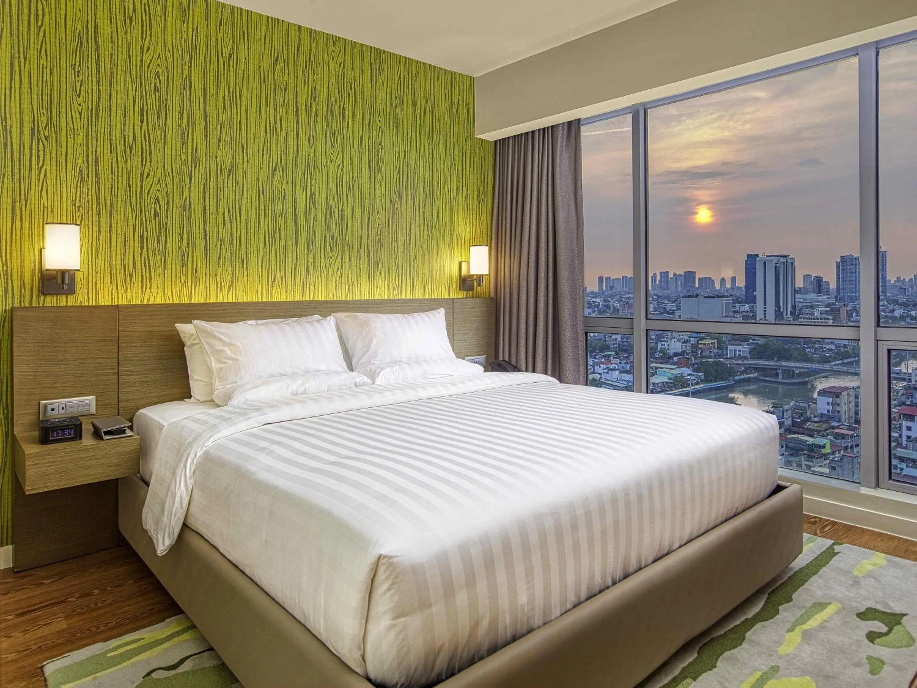 Photo of the whole room, Bed in Novotel Suites Manila at Acqua