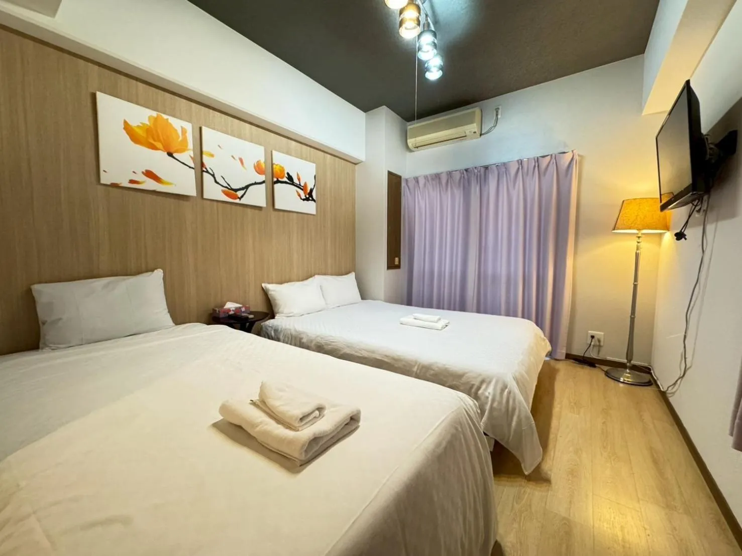 Bed in Sakura Sands Hotel