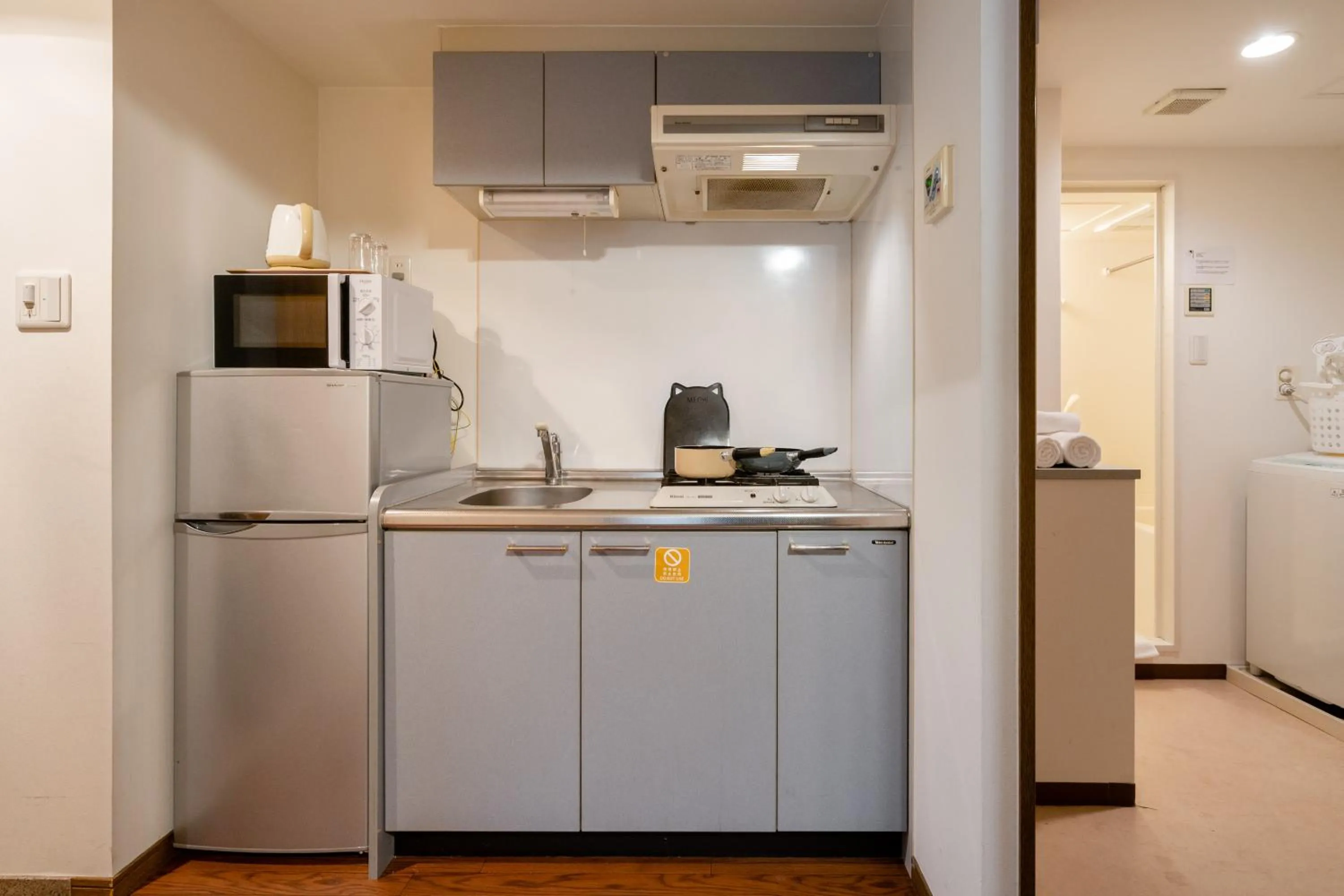 Kitchen or kitchenette in Sakura Sands Hotel