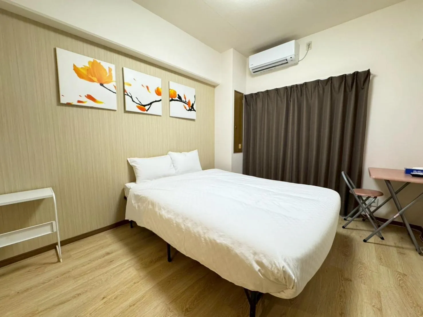 Bed in Sakura Sands Hotel