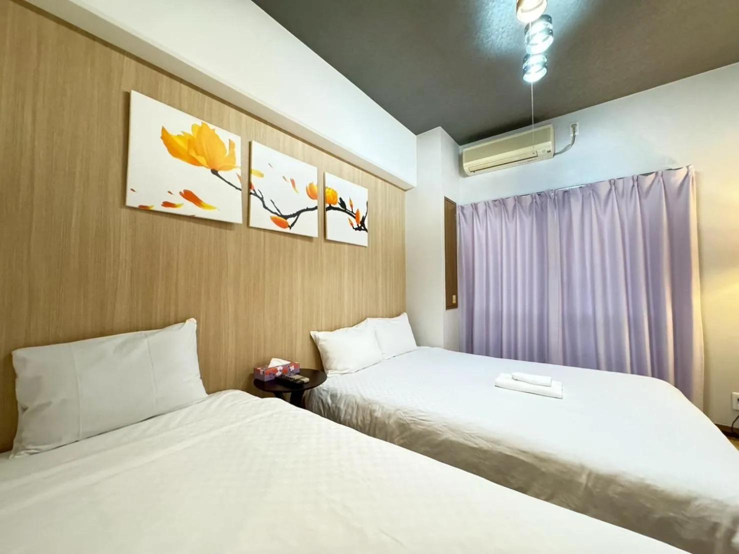 Bed in Sakura Sands Hotel