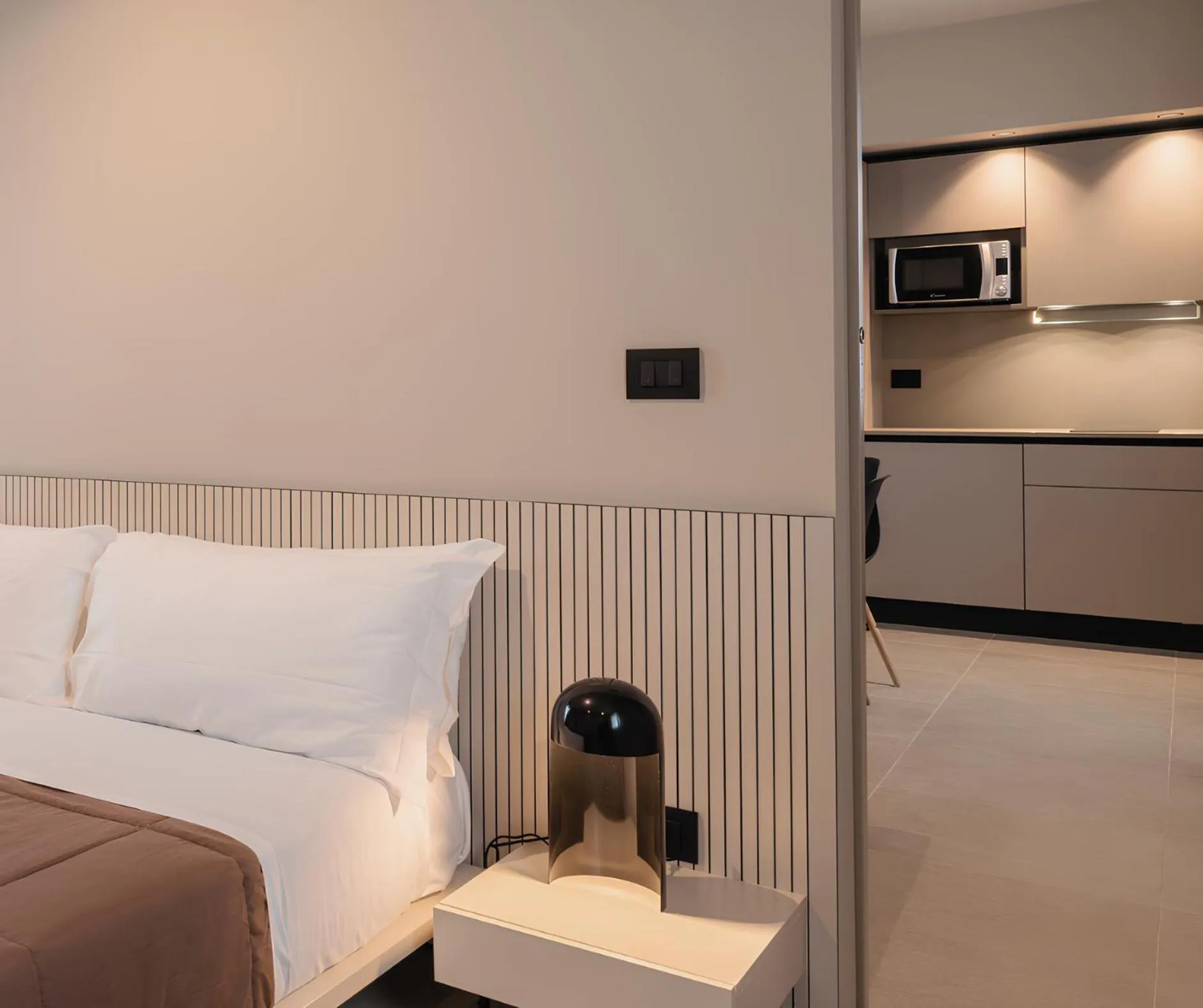 Bed in Amare Suite & Apartments