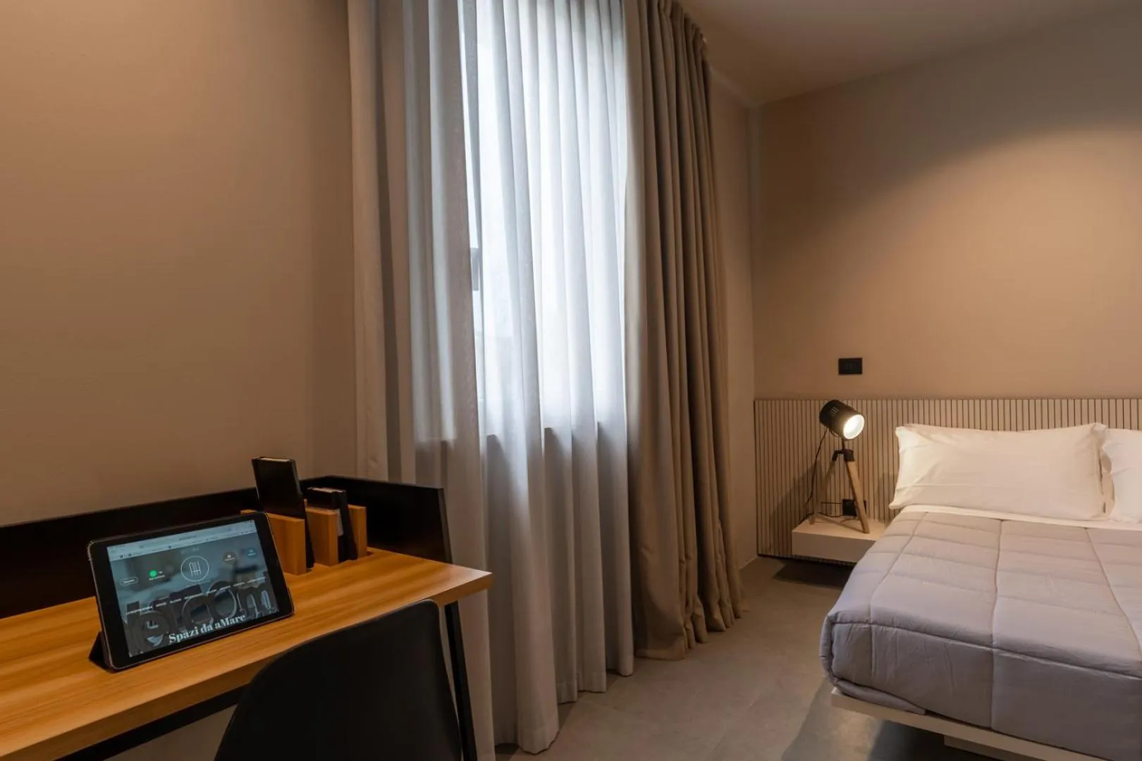 Seating area, Bed in Amare Suite & Apartments