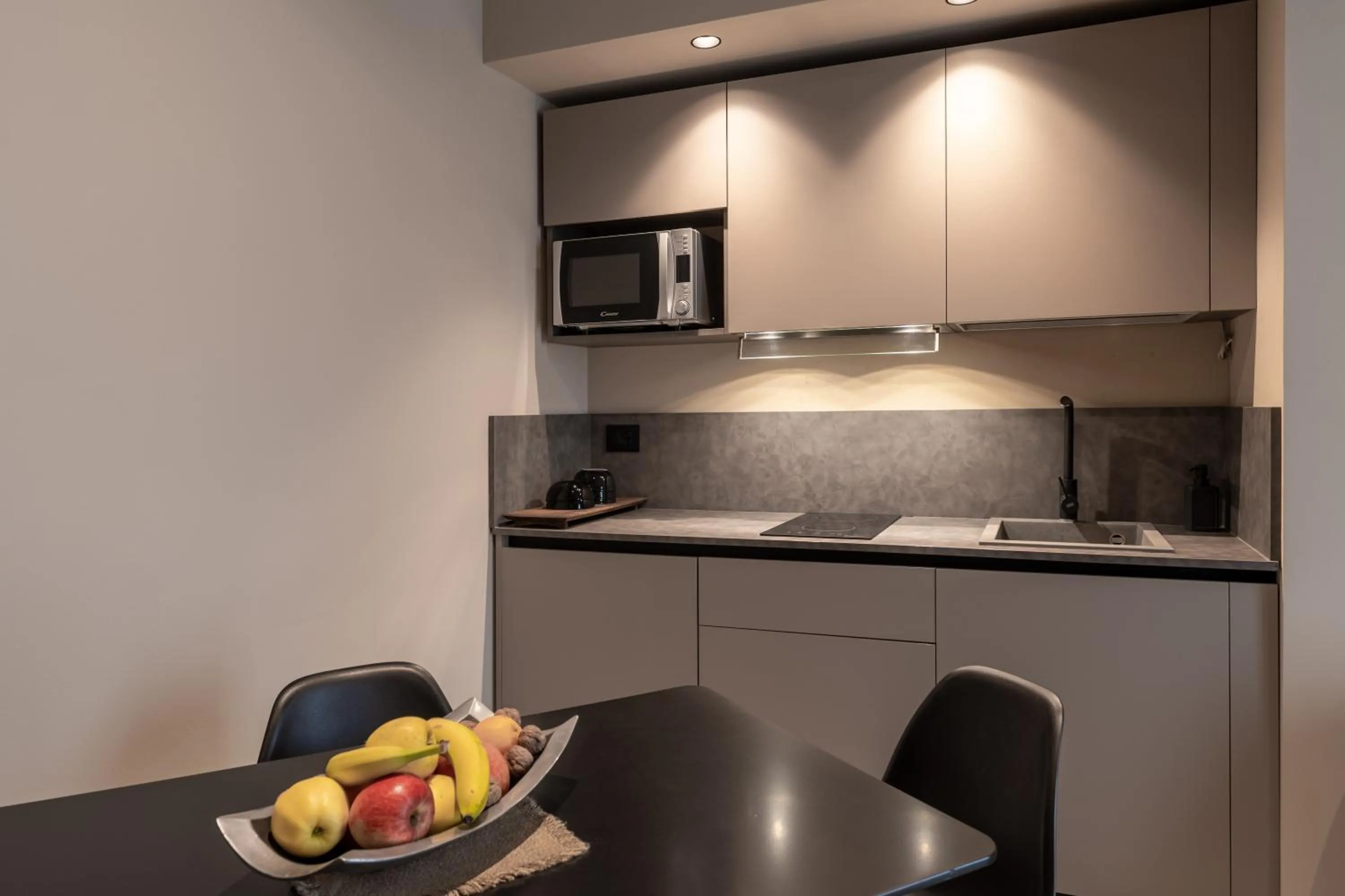 Kitchen or kitchenette in Amare Suite & Apartments