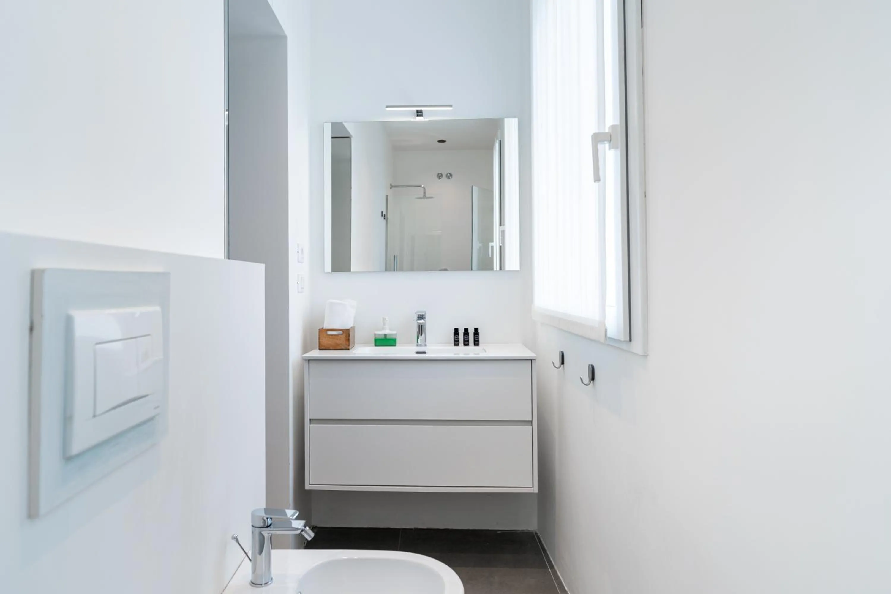 Bathroom in Amare Suite & Apartments