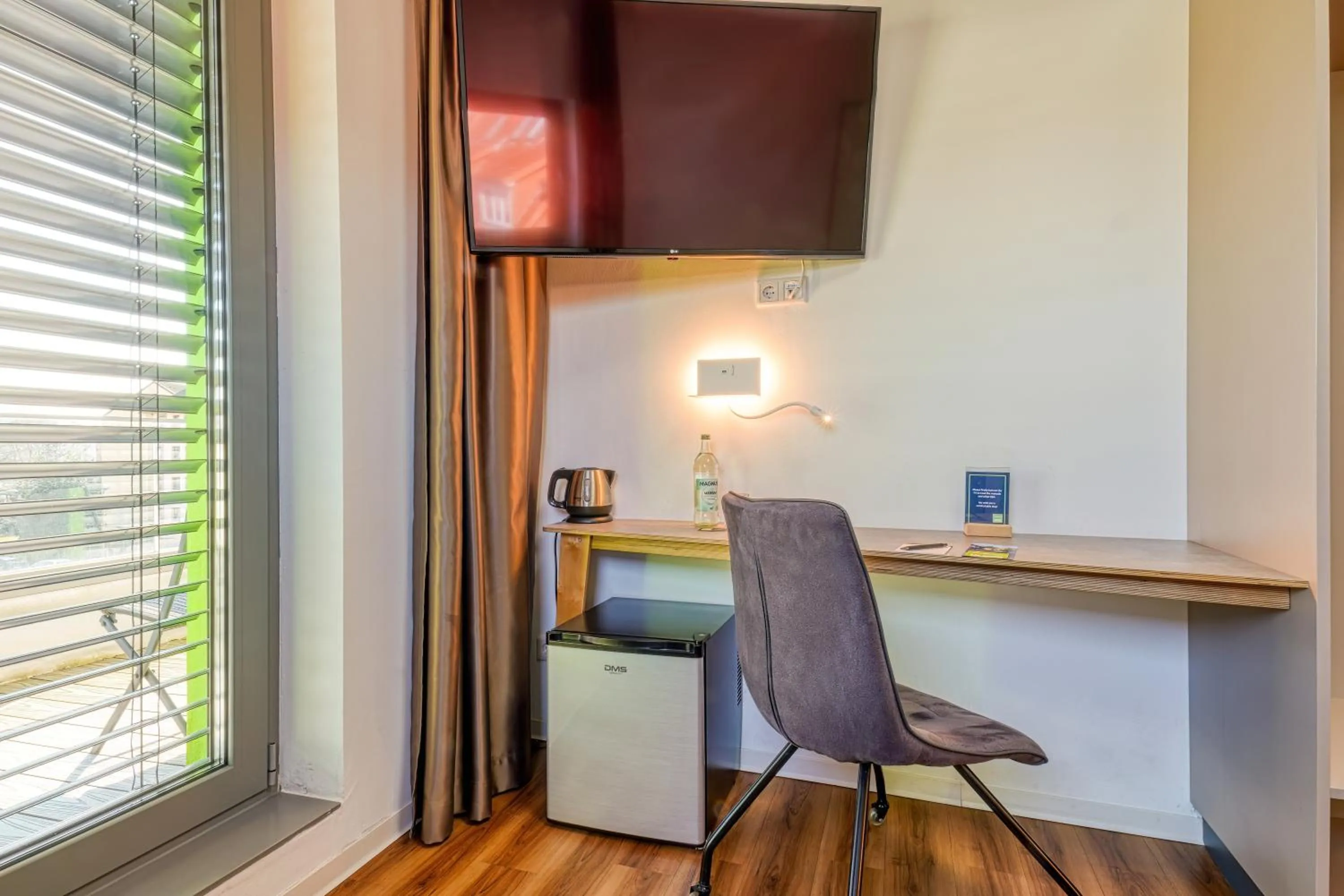 TV and multimedia in NiceToStay by Fairway Hotels