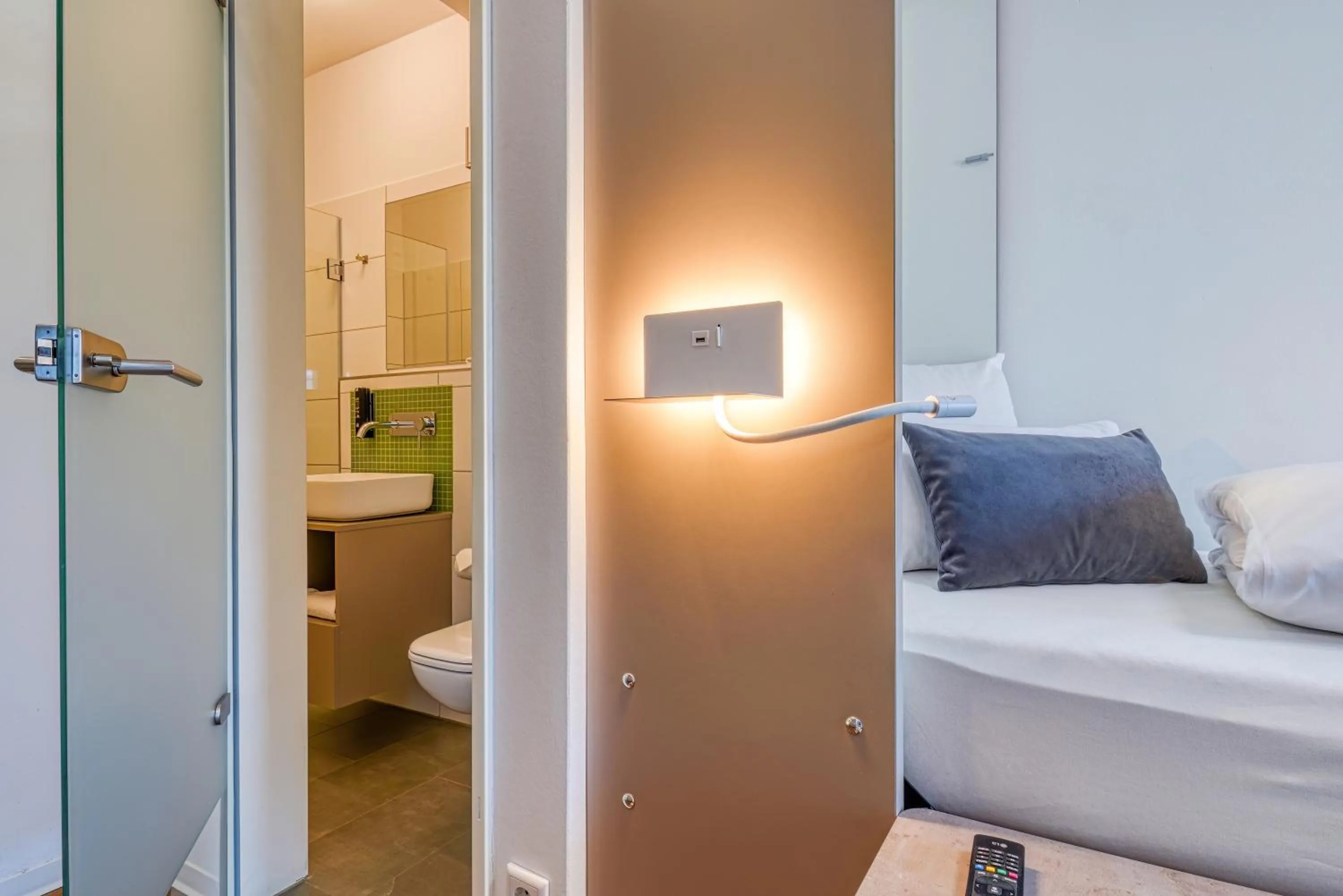 Bed in NiceToStay by Fairway Hotels