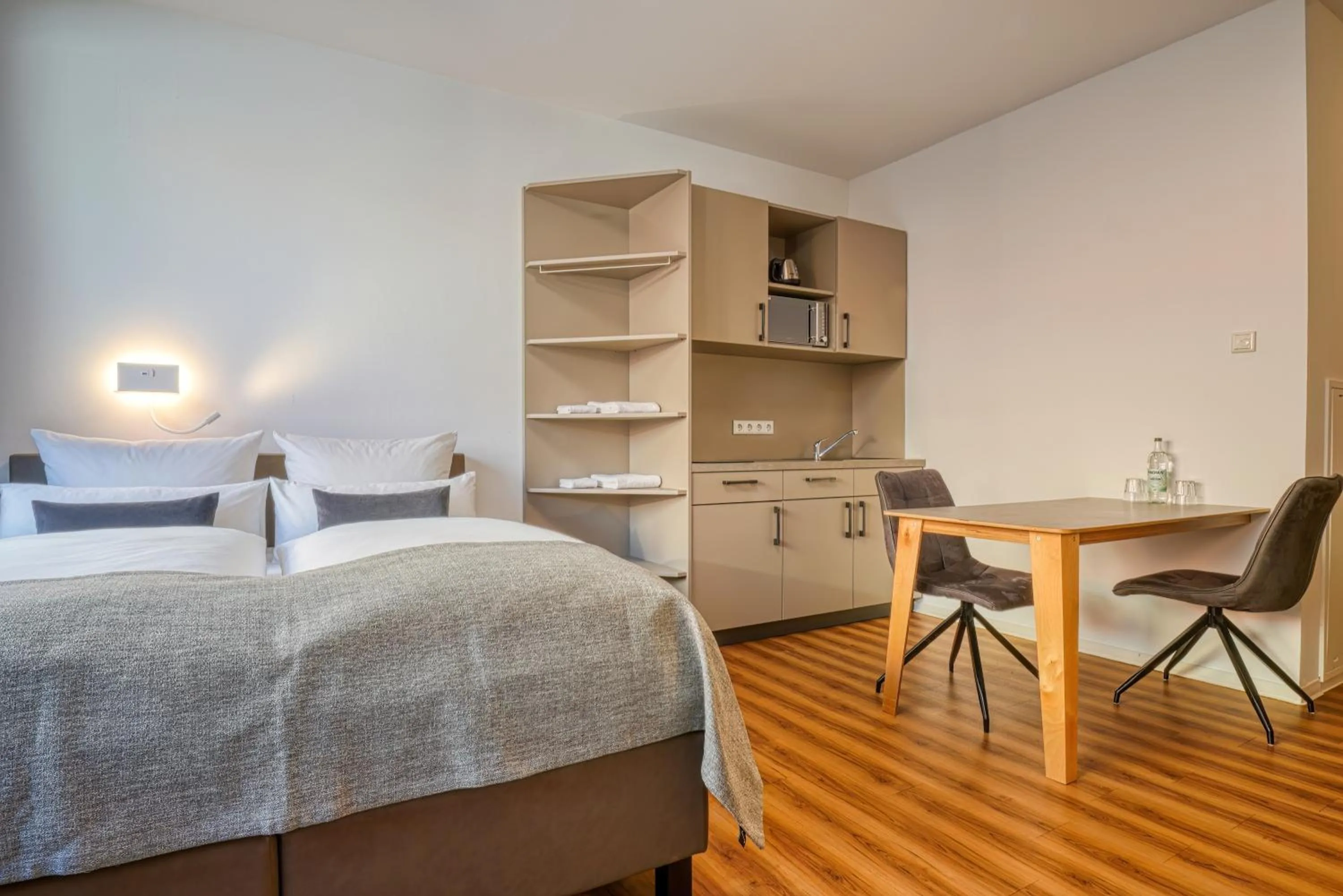 Bed in NiceToStay by Fairway Hotels