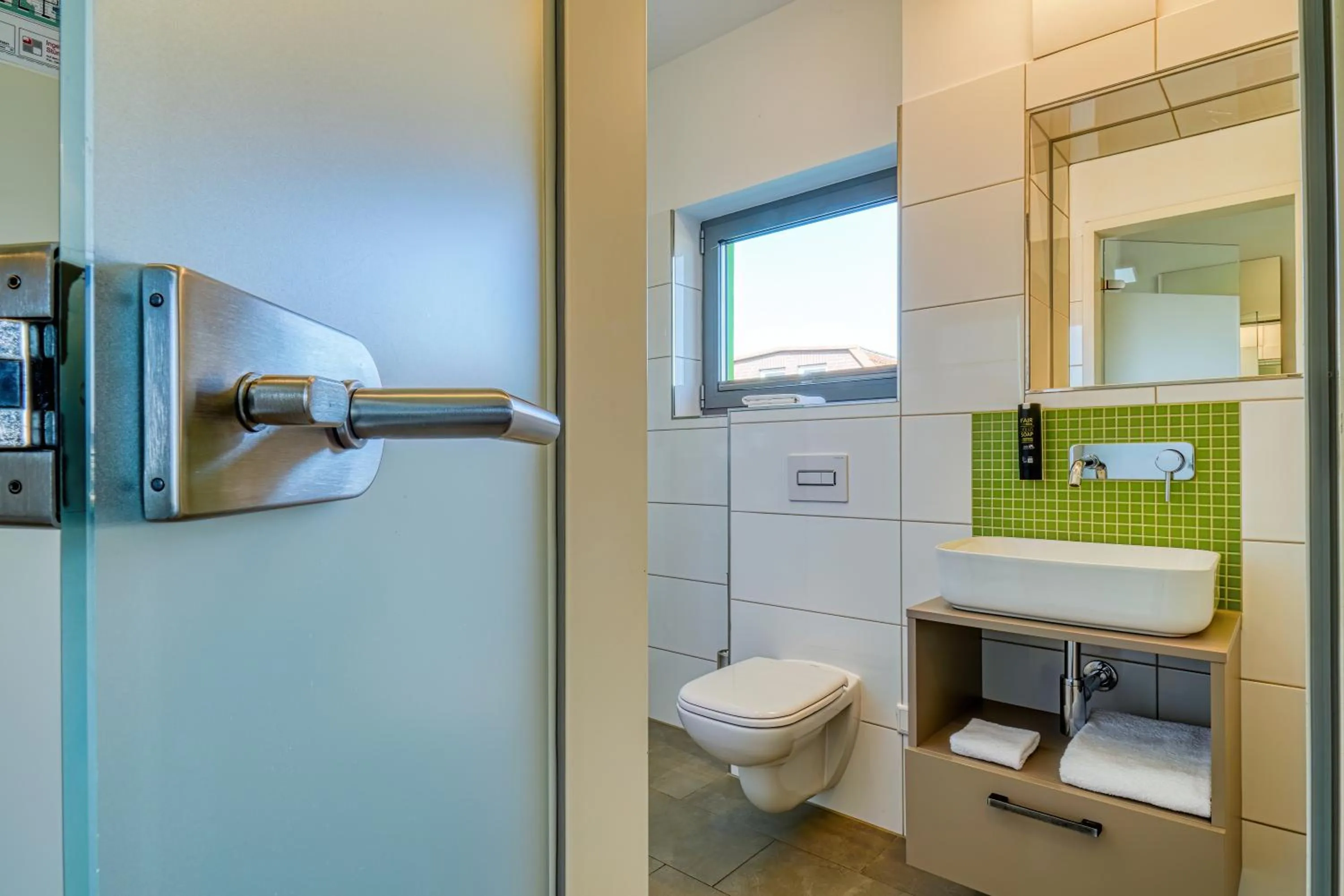 Toilet in NiceToStay by Fairway Hotels