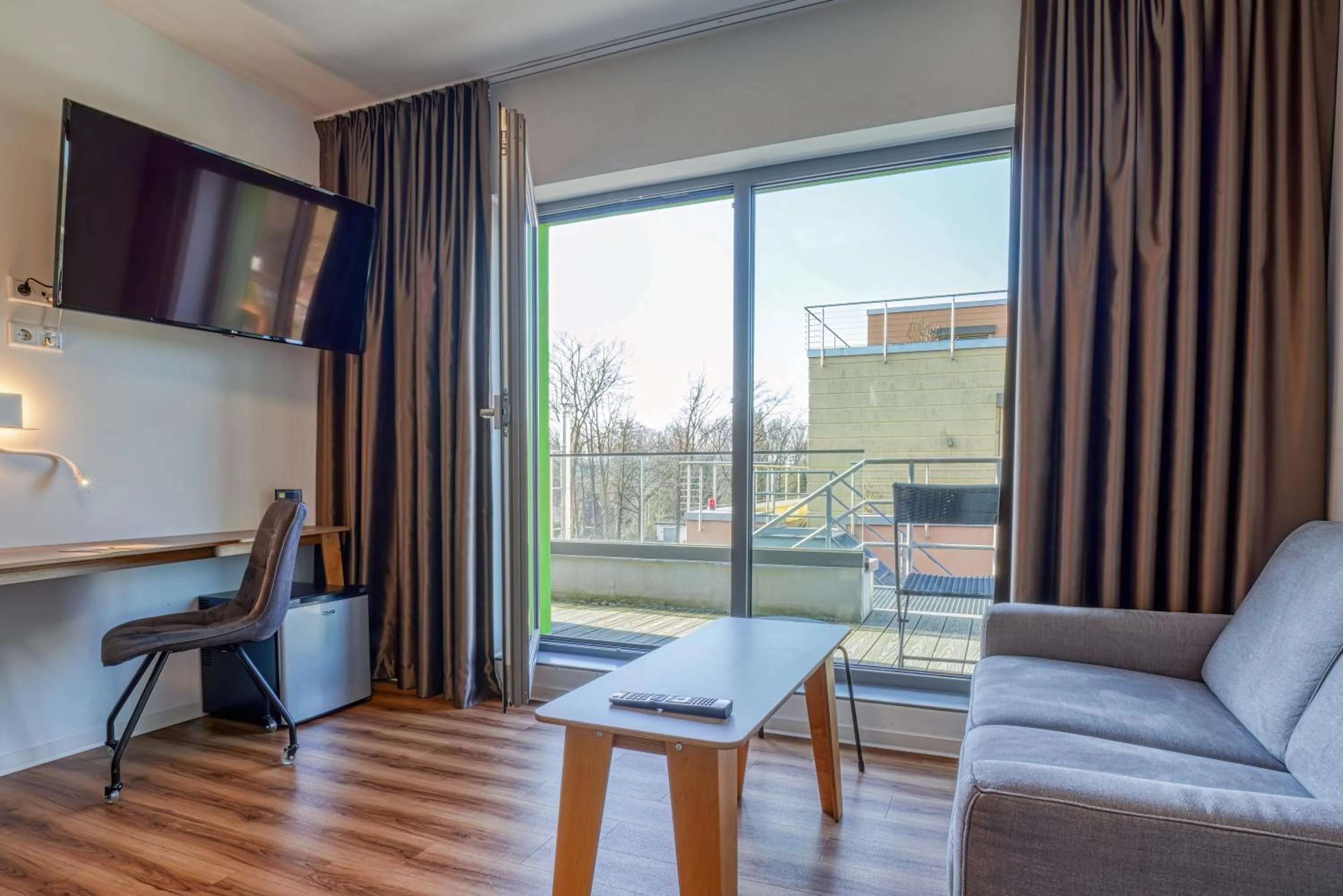 TV and multimedia in NiceToStay by Fairway Hotels