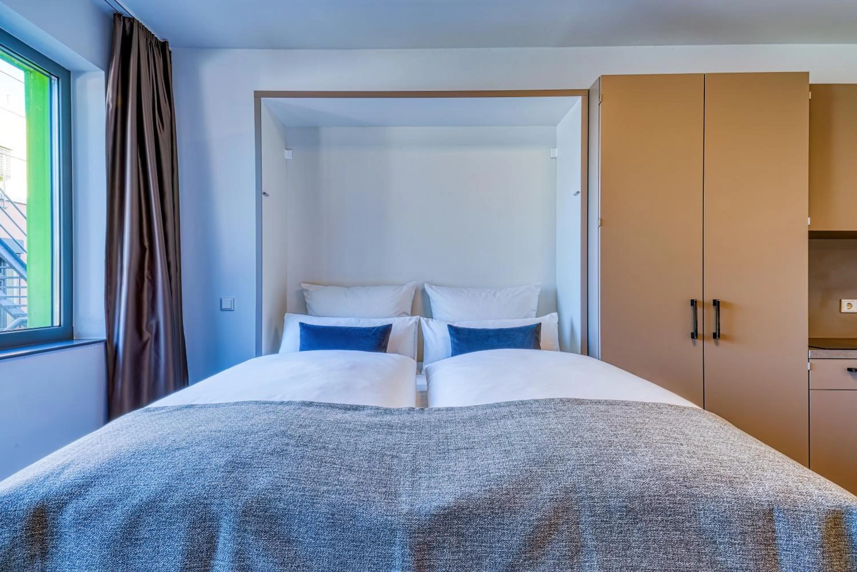 Bed in NiceToStay by Fairway Hotels