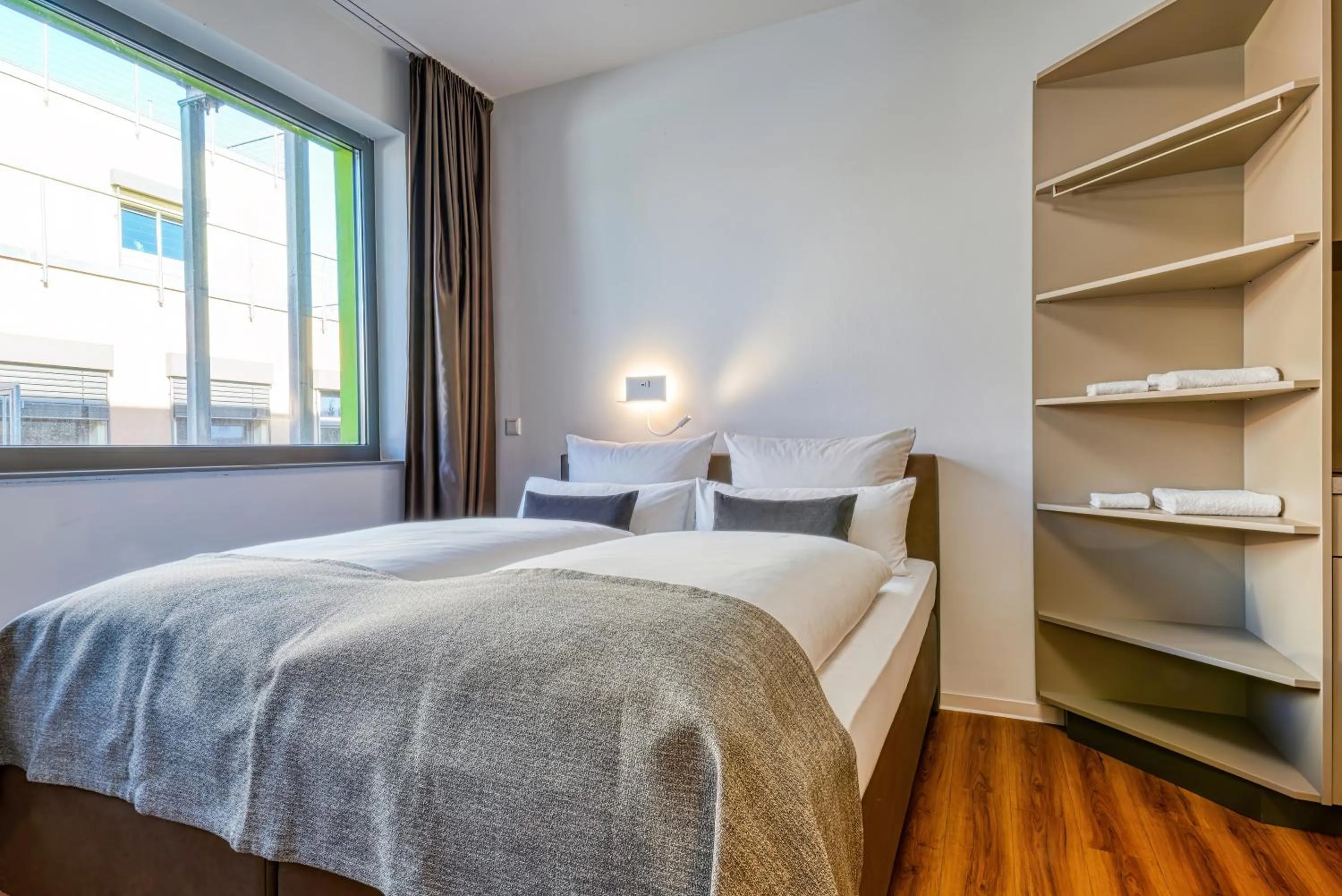 Bed in NiceToStay by Fairway Hotels