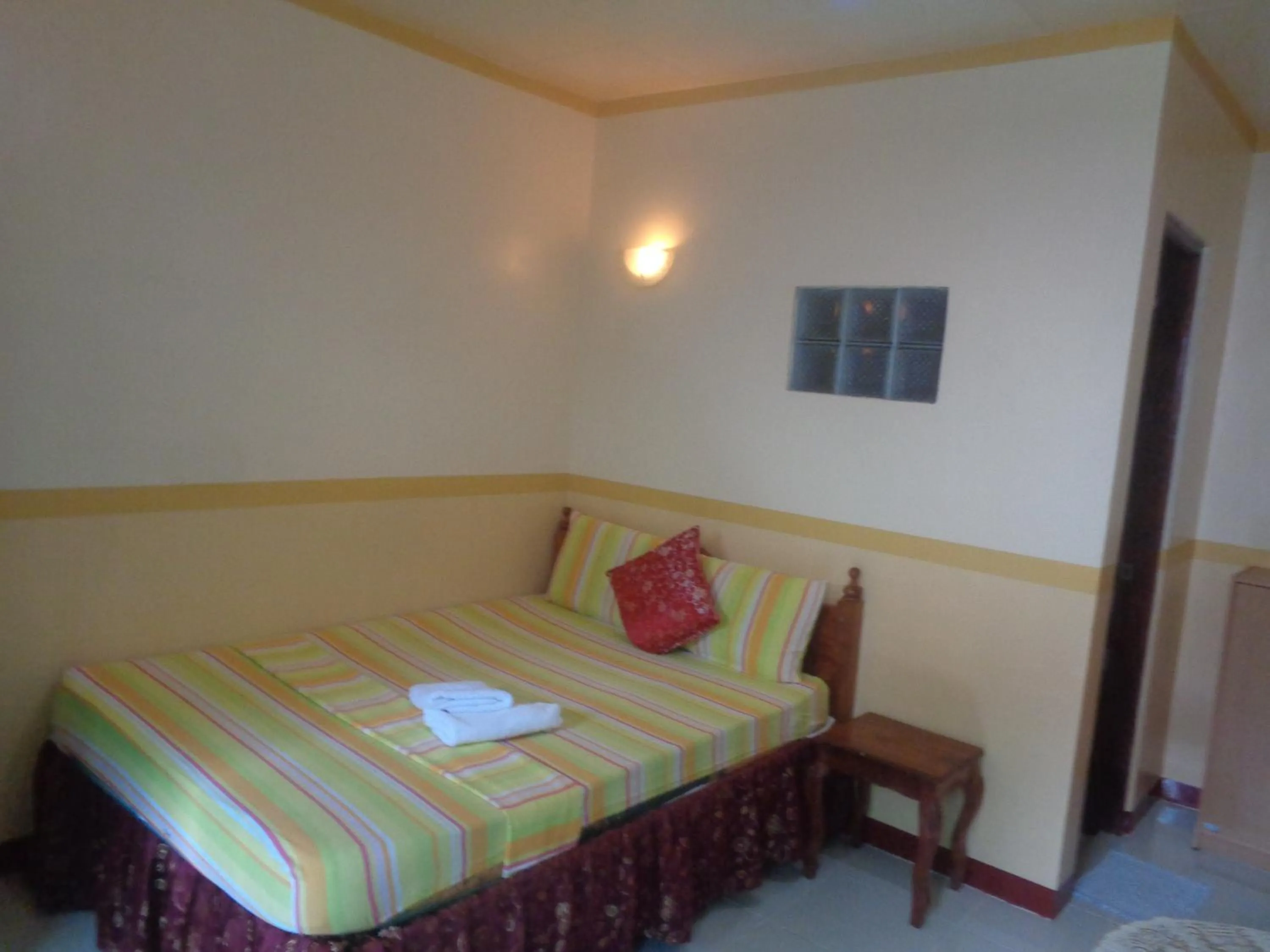 Bed in Lucky Garden Inn