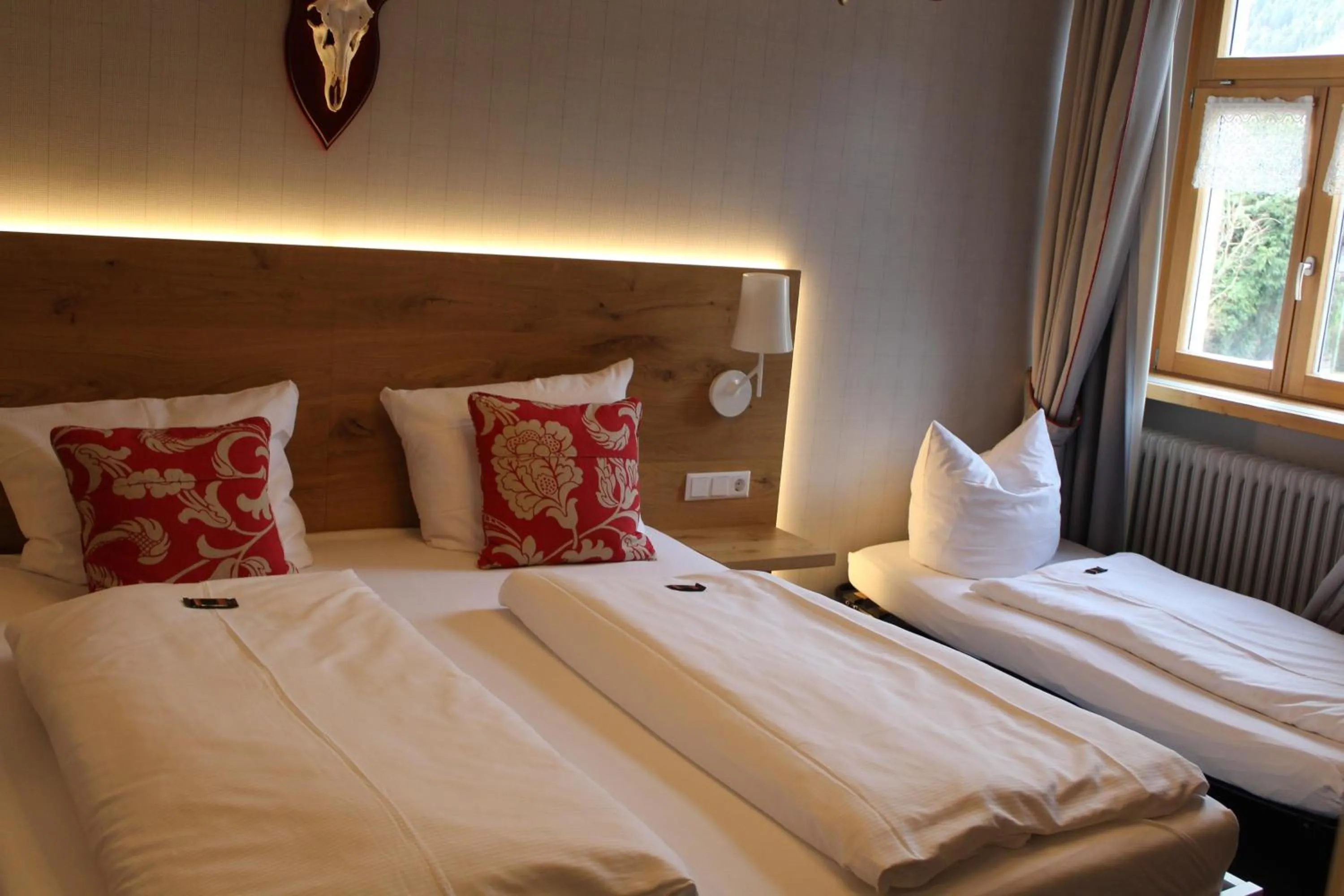 Bed in Goldener Adler Oberried - Hotel & Appartements