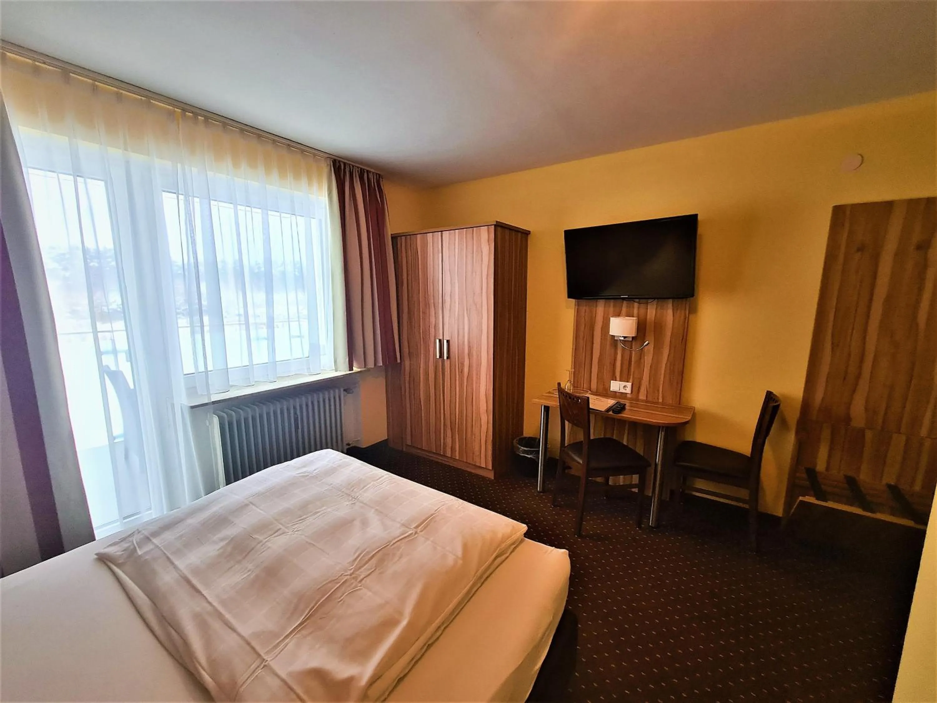 Photo of the whole room, Bed in Hotel Silberhorn