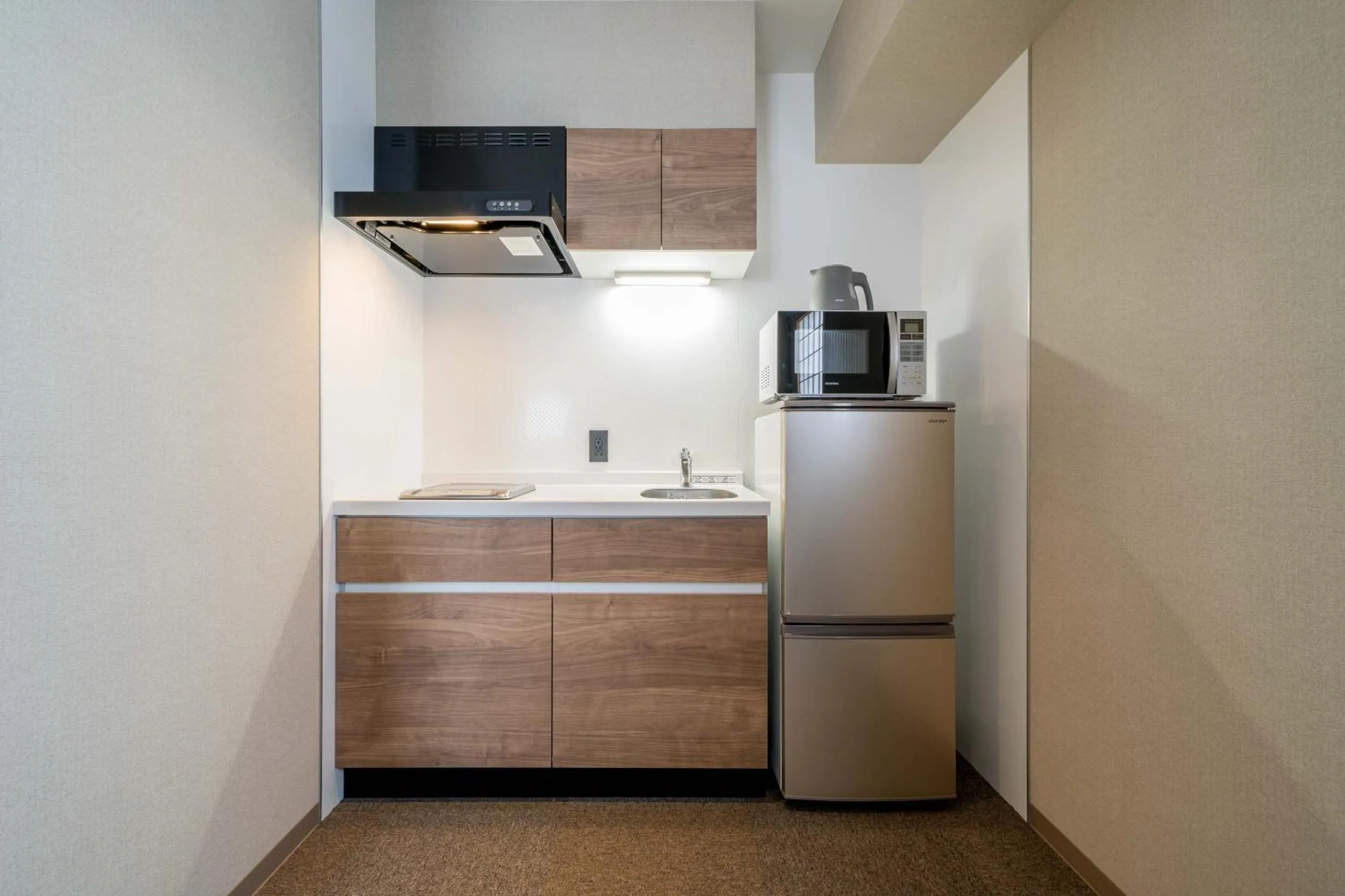 kitchen in RESI STAY Hotel Sun Chlorella