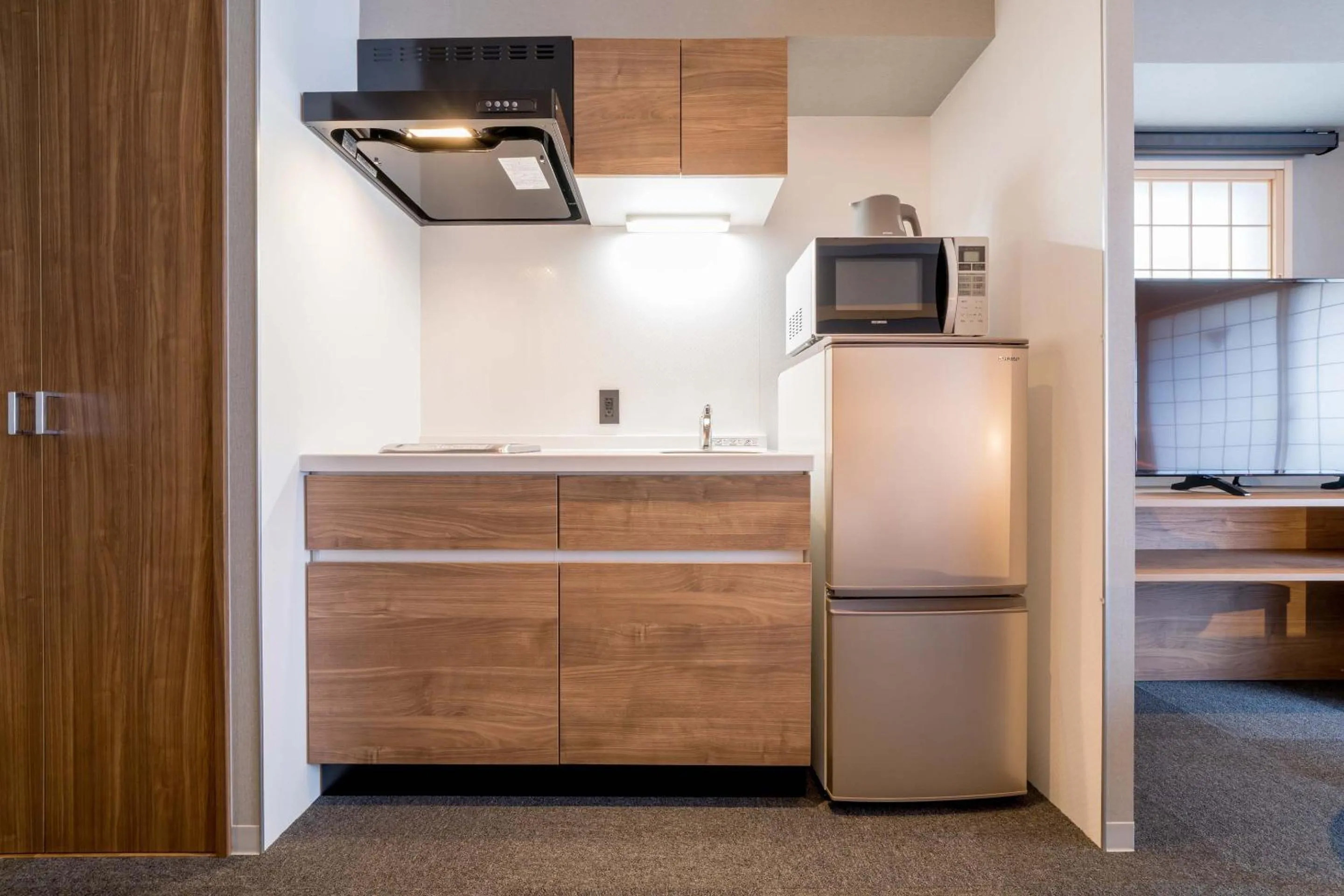 Kitchen or kitchenette in RESI STAY Hotel Sun Chlorella