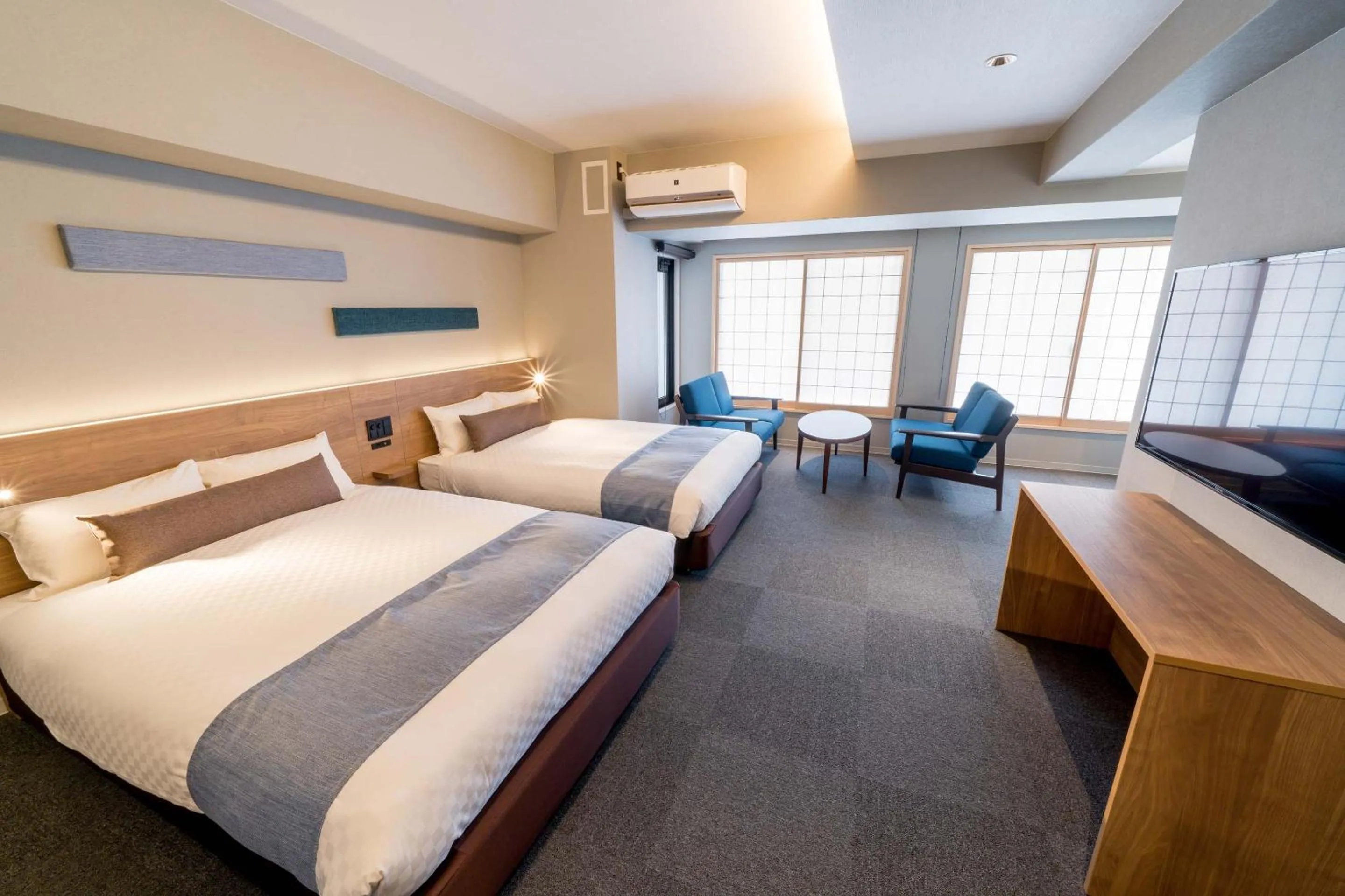 Seating area, Bed in RESI STAY Hotel Sun Chlorella