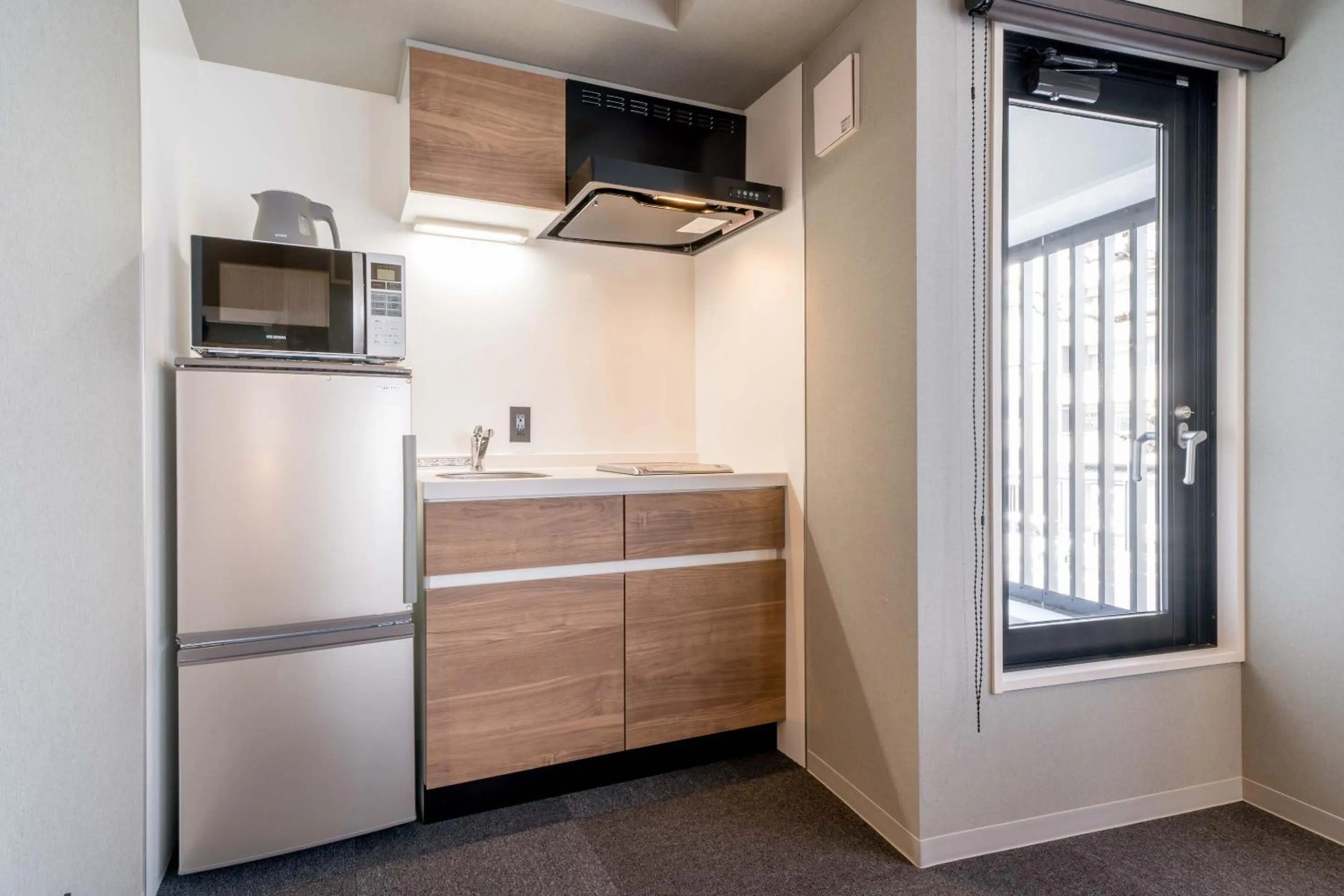 Kitchen or kitchenette in RESI STAY Hotel Sun Chlorella