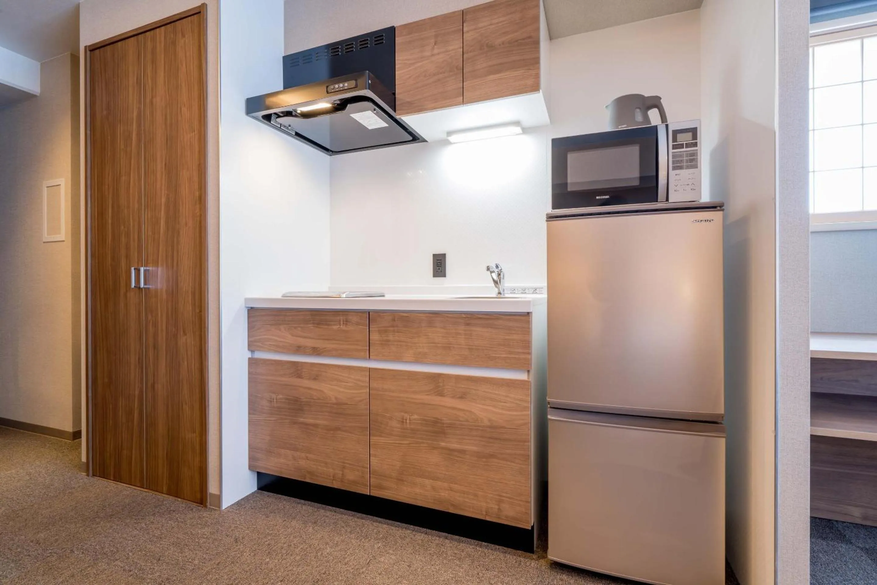 Kitchen or kitchenette in RESI STAY Hotel Sun Chlorella