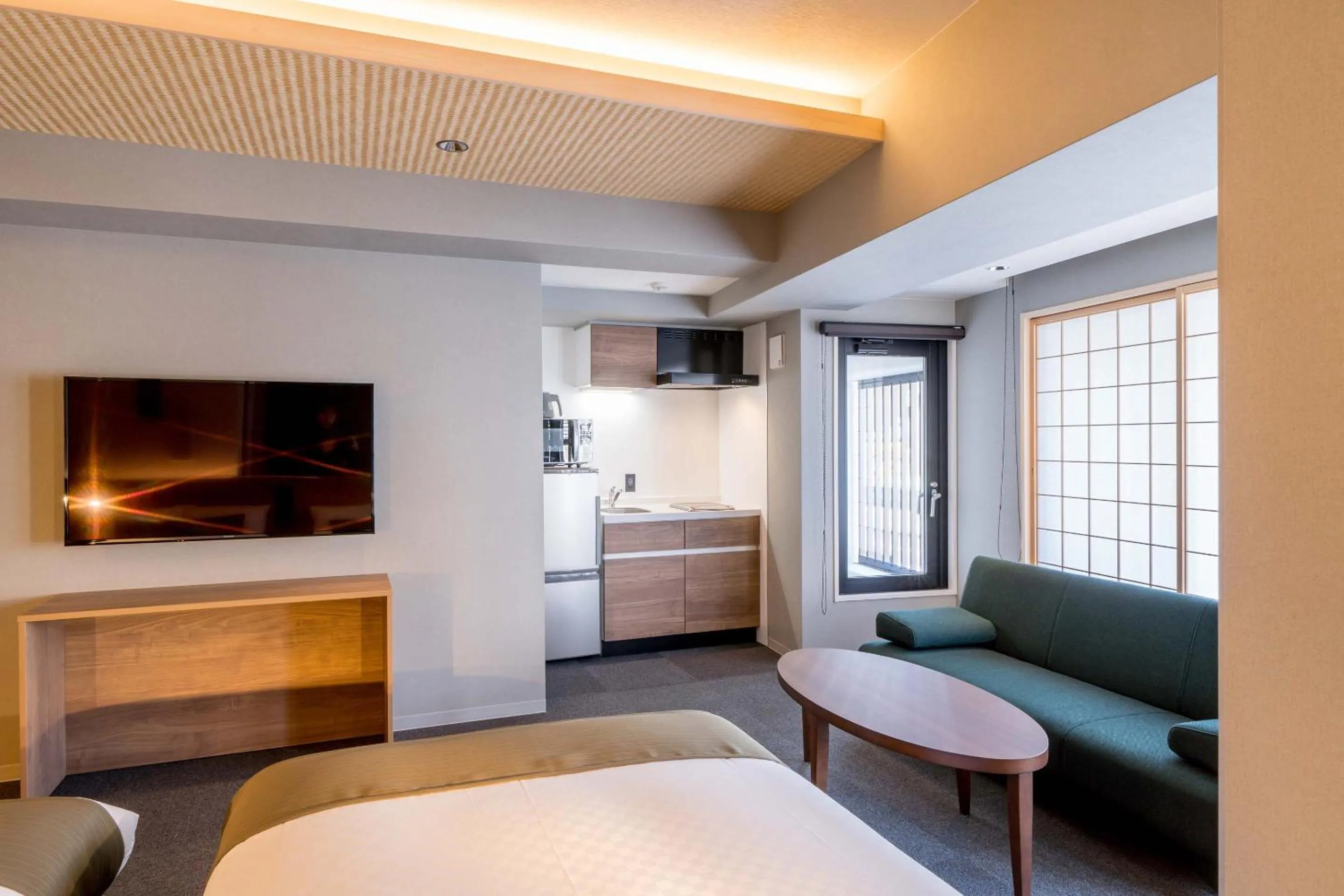 Living room, Bed in RESI STAY Hotel Sun Chlorella