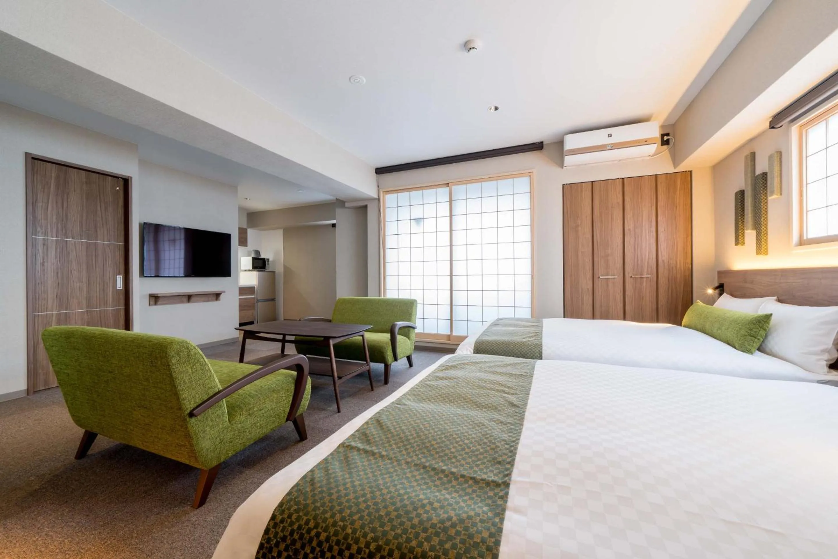 Living room, Bed in RESI STAY Hotel Sun Chlorella