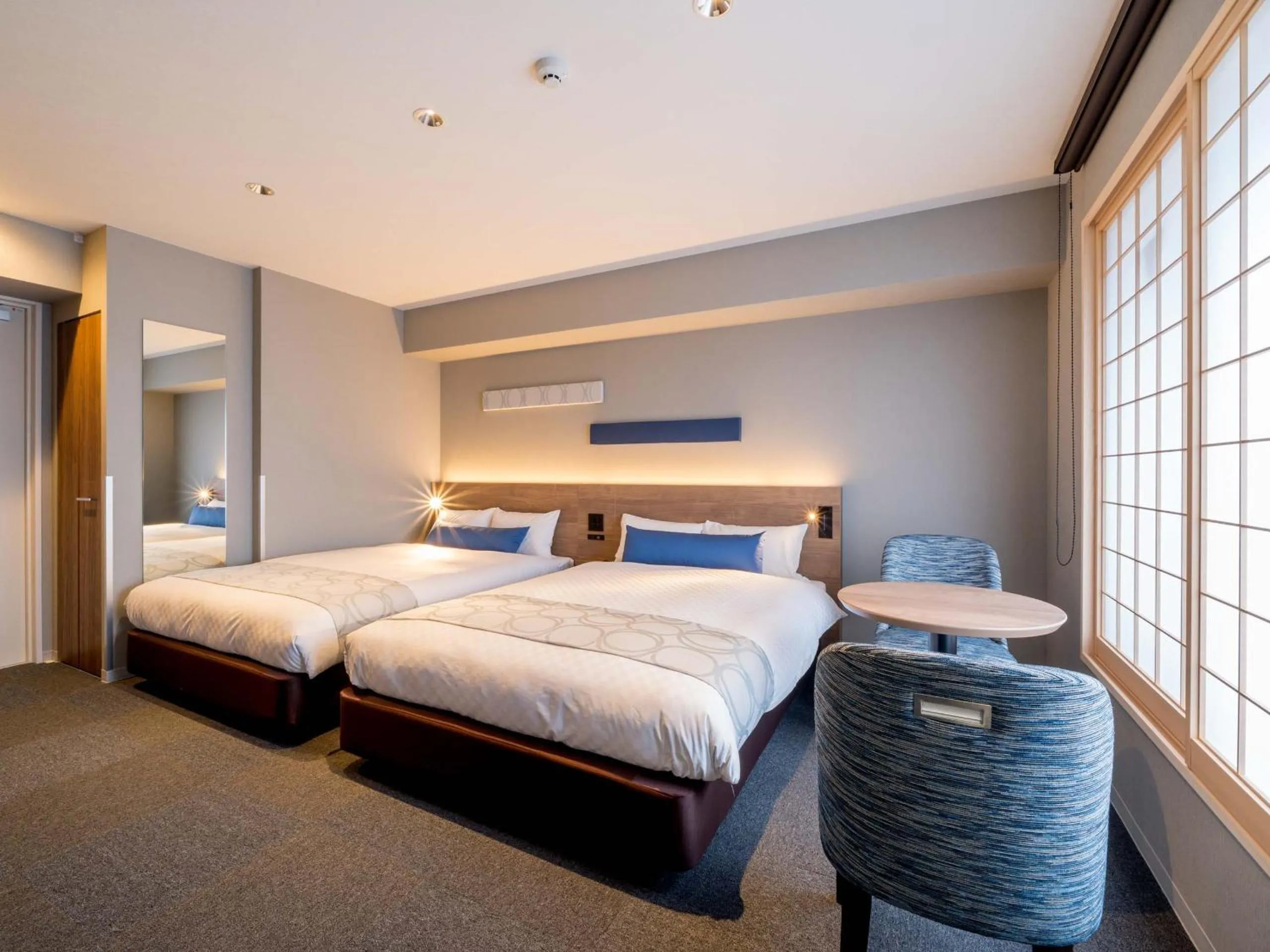 Bed in RESI STAY Hotel Sun Chlorella