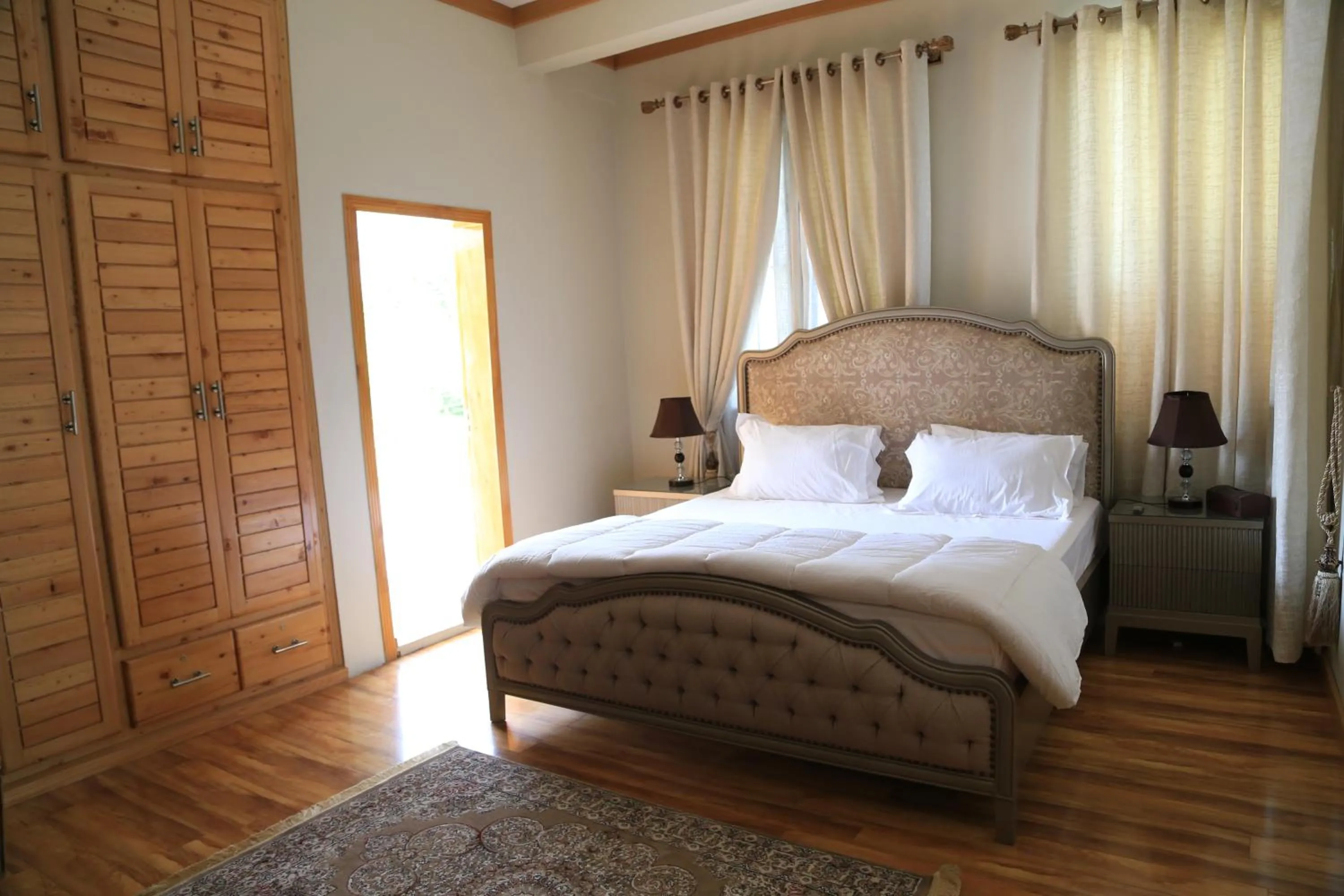 Bed in ISLE OF HIGHLAND TOURS Guest House