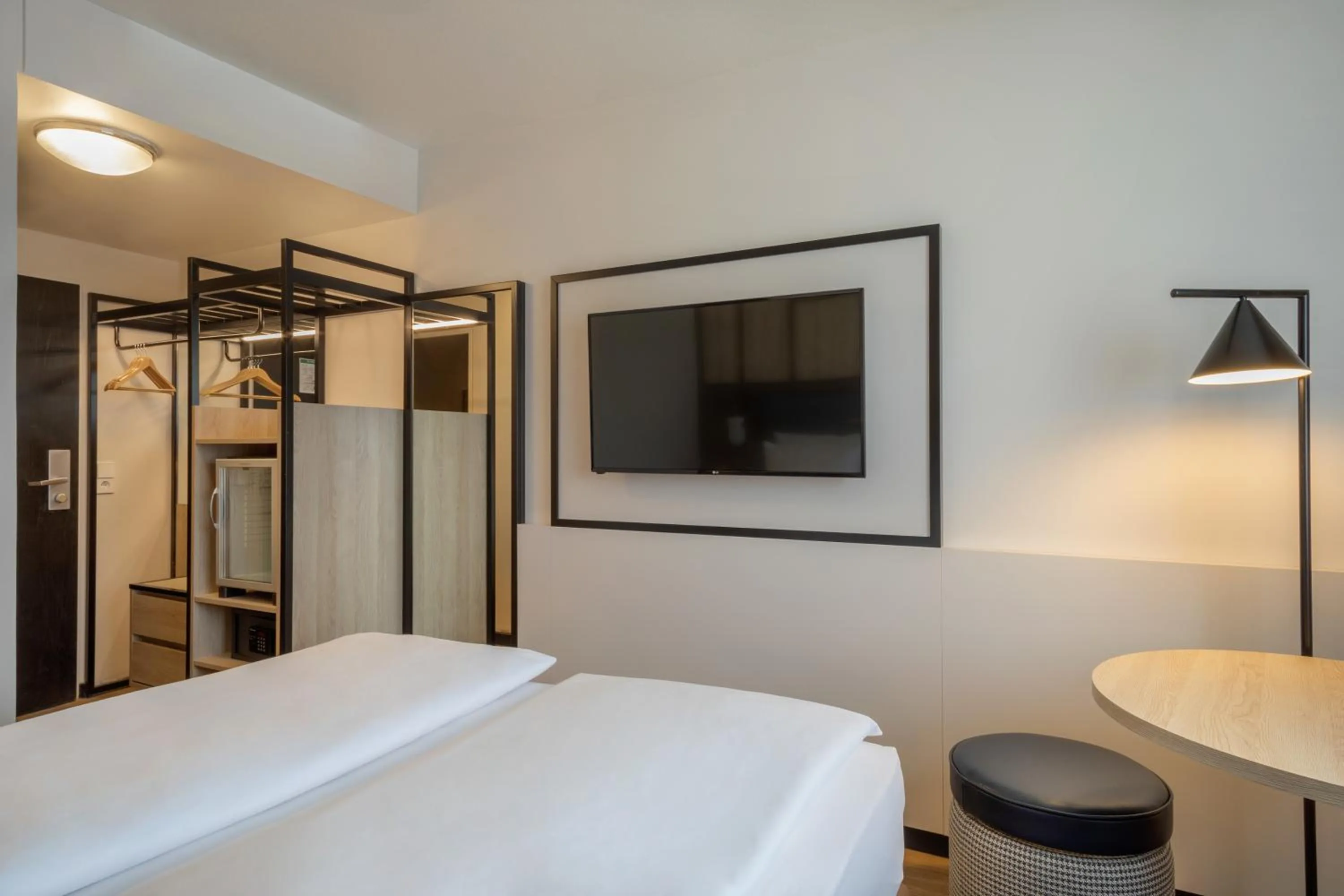 Bed in Hotel München City Center affiliated by Meliá