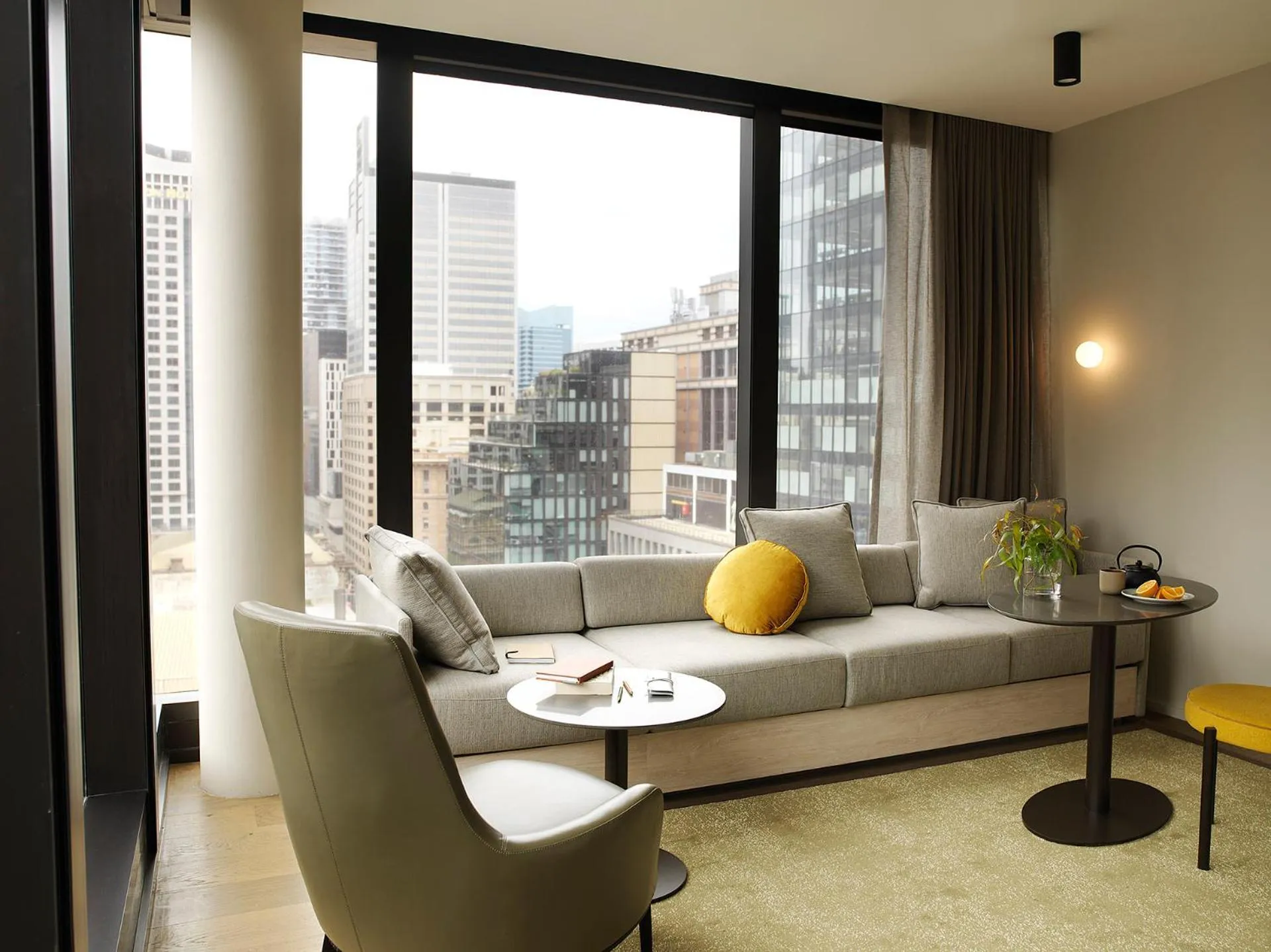 Seating area in A by Adina Sydney